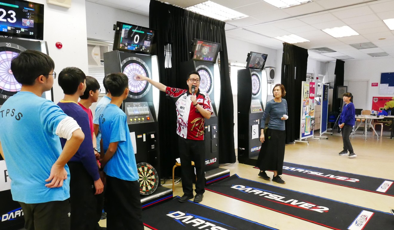 Darts has gone ‘dojo’ with Kevin Leung teaching youngsters at one of the academies in Hong Kong.