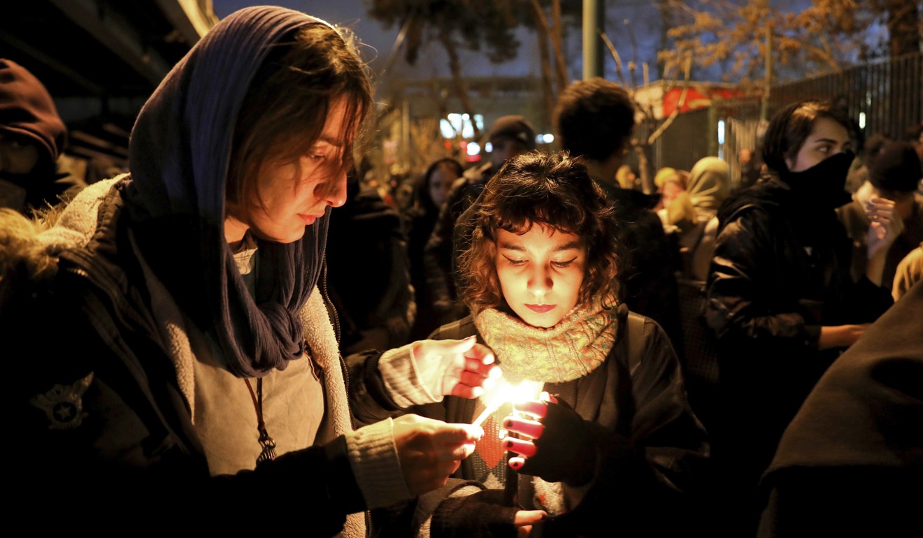 People gather for a candlelight vigil in Tehran in January to remember the victims of the Ukraine plane crash. Photo: AP