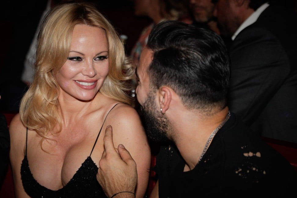 US actress Pamela Anderson and French soccer player Adil Rami at the premiere of the Bionic Showgirl show at the Crazy Horse cabaret in Paris in June 2019. Photo: AFP