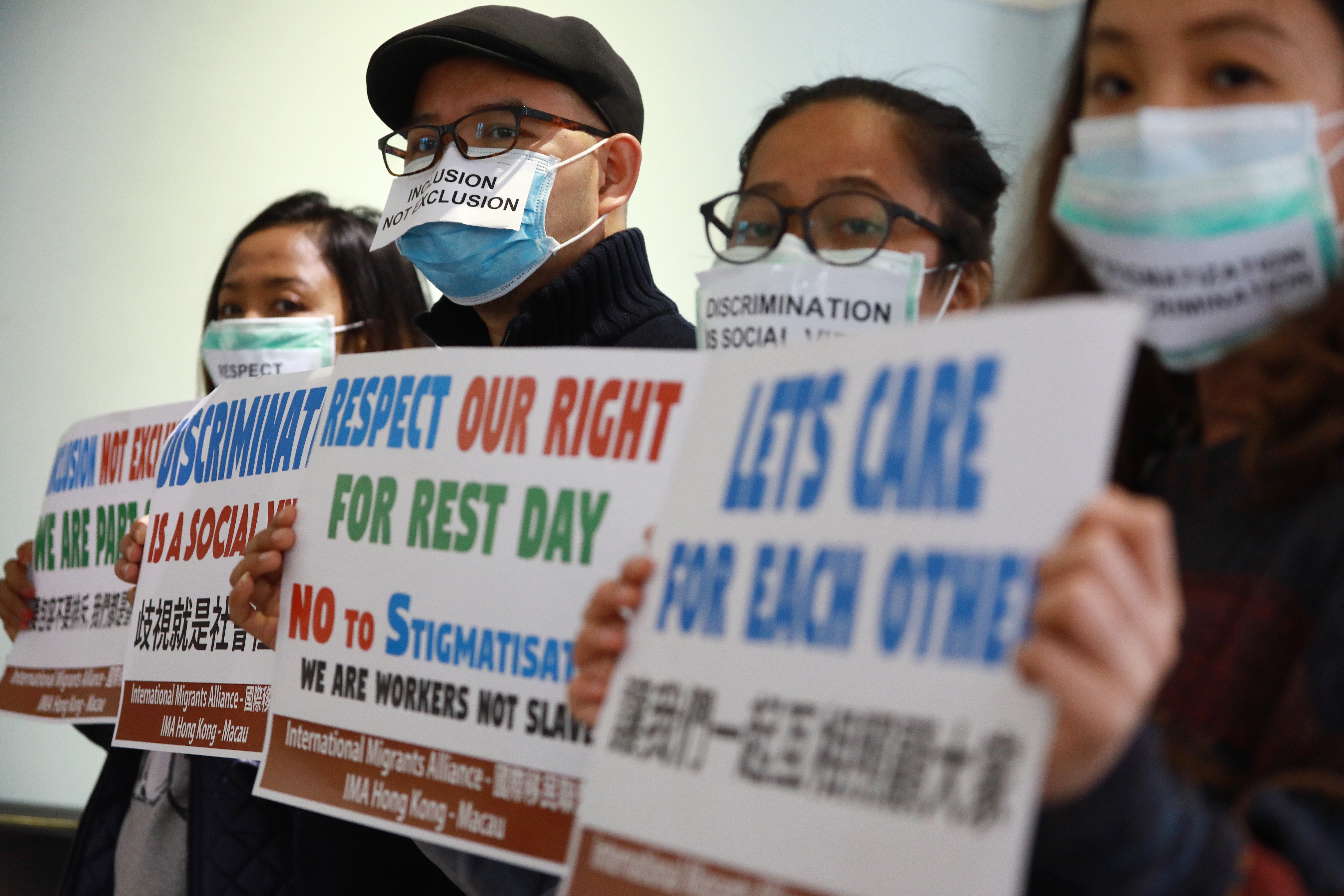 Representatives from multiple immigrant rights groups attend a press conference on domestic workers facing discrimination during Wuhan coronavirus outbreak. Photo: May Tse
