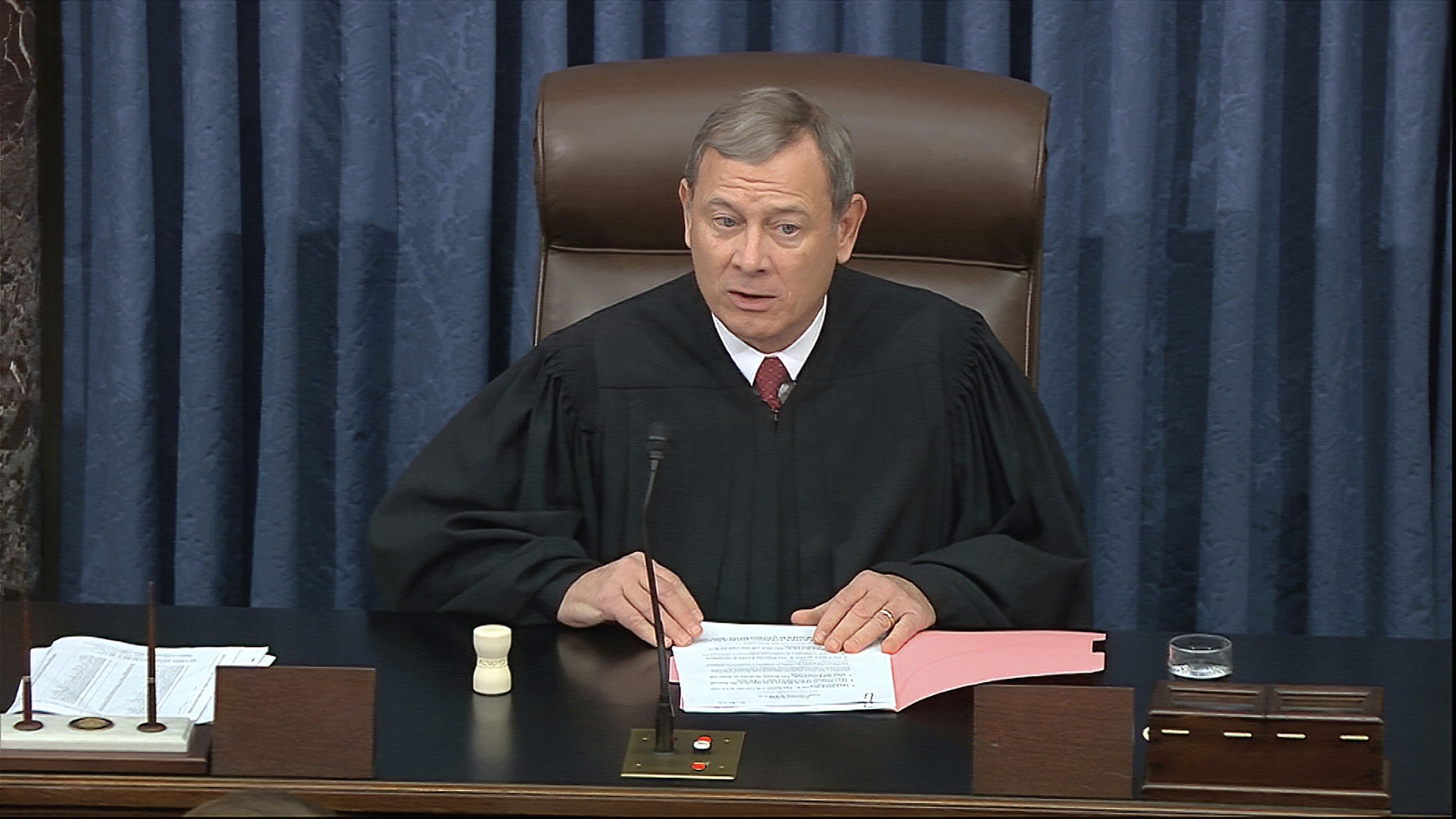 Chief Justice of the United States John Roberts speaks before the vote in the impeachment trial against President Donald Trump. Photo: Senate Television via AP