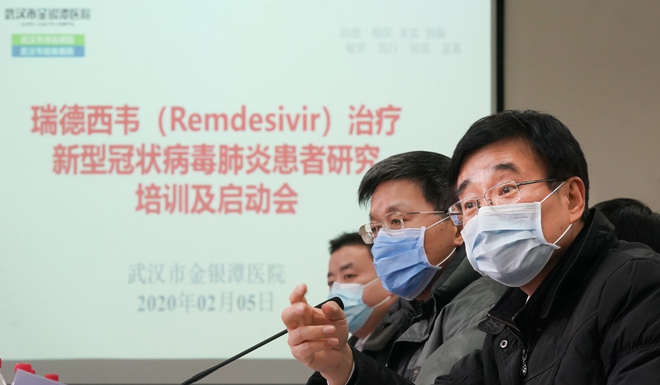 Wang Chen (right) president of the Chinese Academy of Medical Sciences, speaking Wednesday at a conference in Wuhan at which it was announced that clinical trials using the antiviral drug remdesivir have been approved. Photo: Xinhua