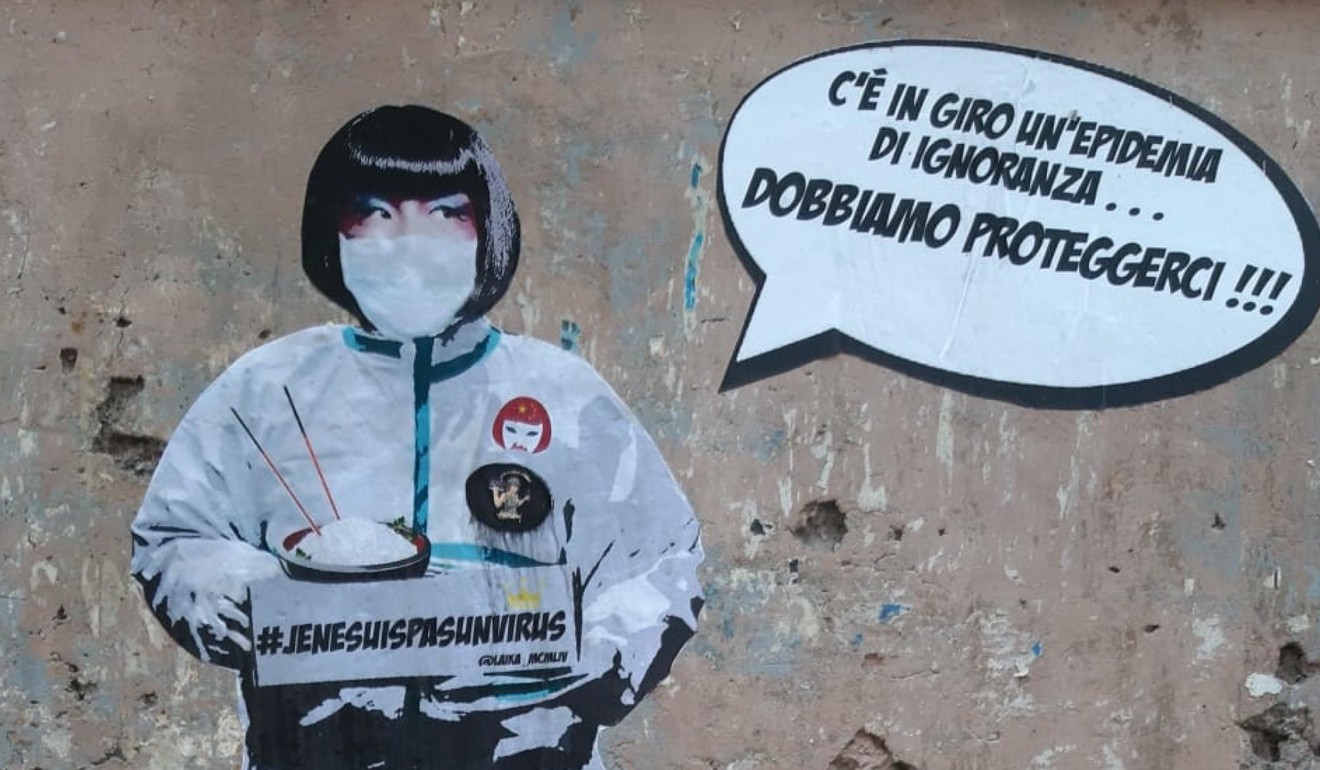 A detail of a mural about the coronavirus outbreak in the Chinese district of Rome on Tuesday. The image of an Asian woman says 'There is an epidemic of ignorance around … We must protect ourselves’ and the figure holds a sign reading '#JeNeSuisPasUnVirus'. Photo: EPA-EFE