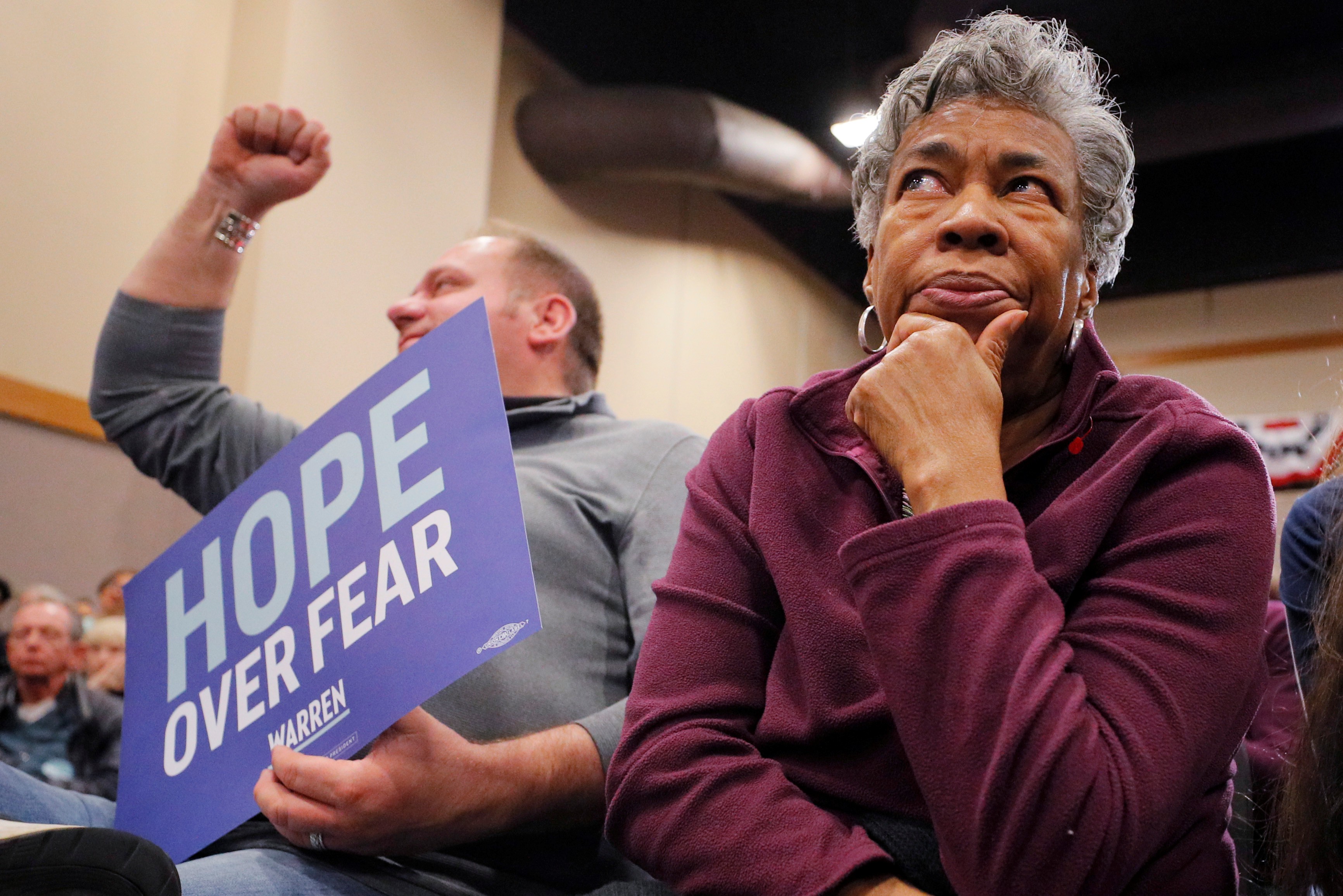 Audience members listen at a Democratic caucus rally in Iowa. Photo: Reuters