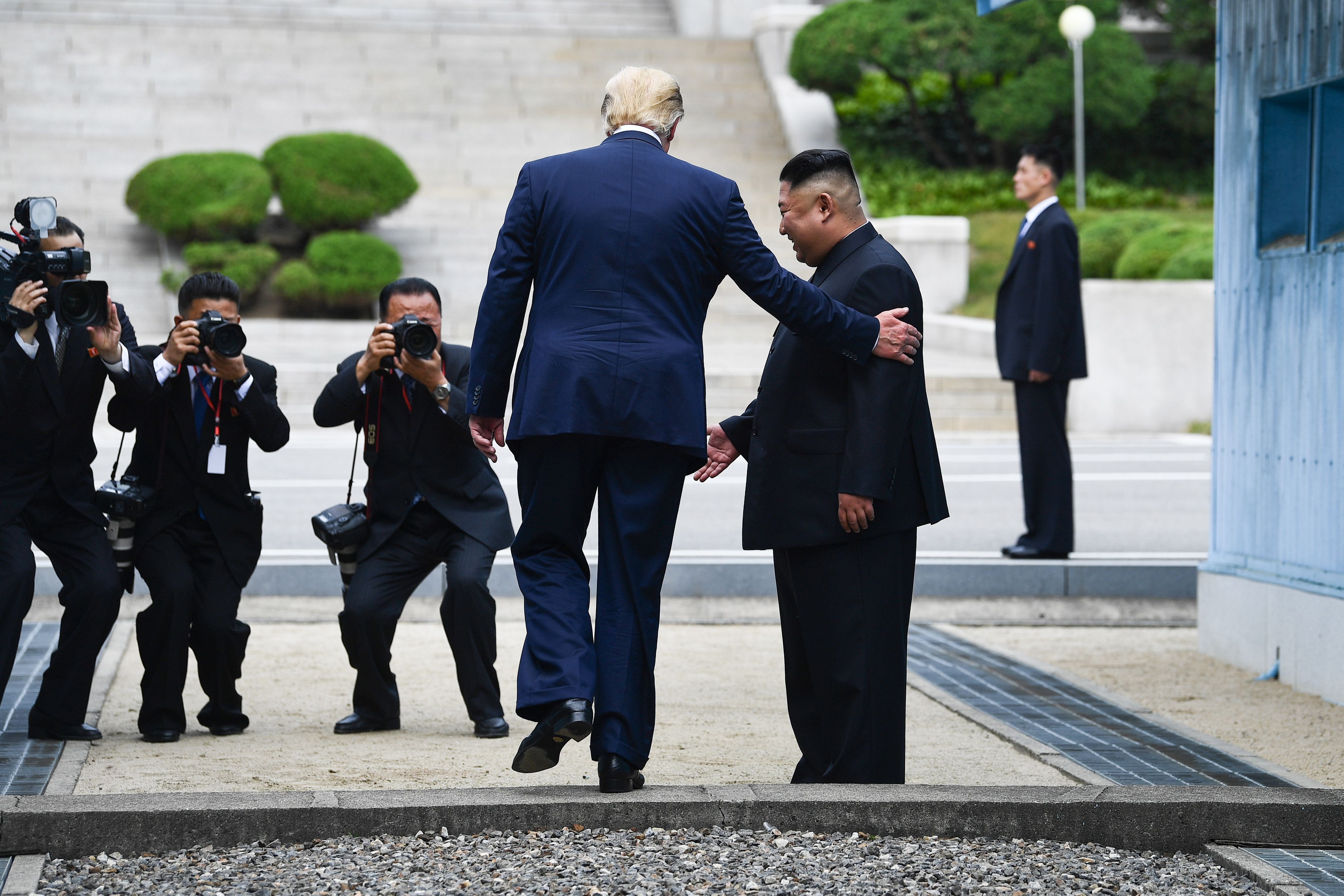 US President Donald Trump meets Kim Jong-un in the demilitarised zone between the two Koreas. Photo: AFP