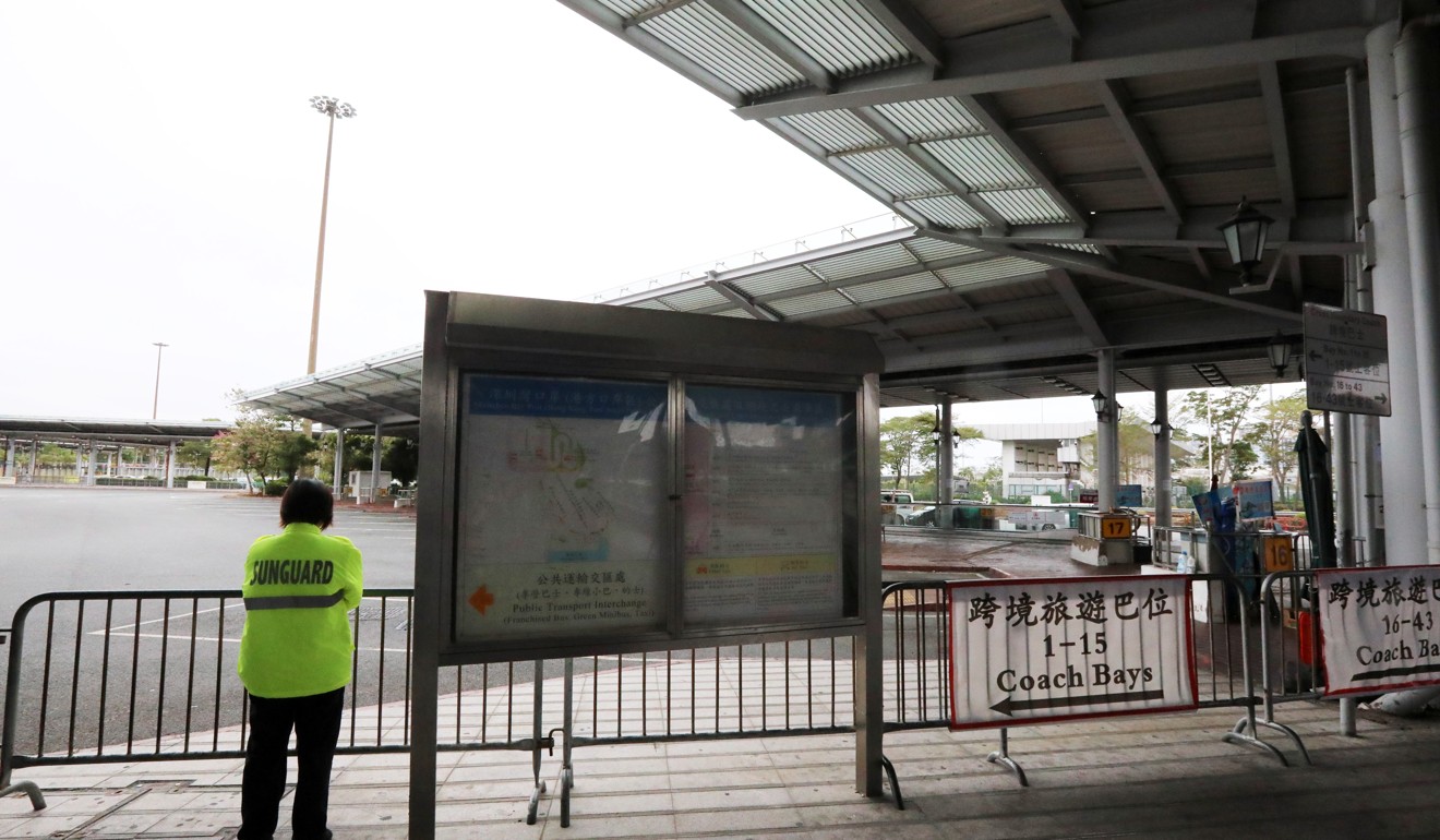 The bus transfer area at Shenzhen Bay port sits largely empty on February 8 after a new enforced quarantine plan for cross-border travellers was put into effect. Photo: Felix Wong