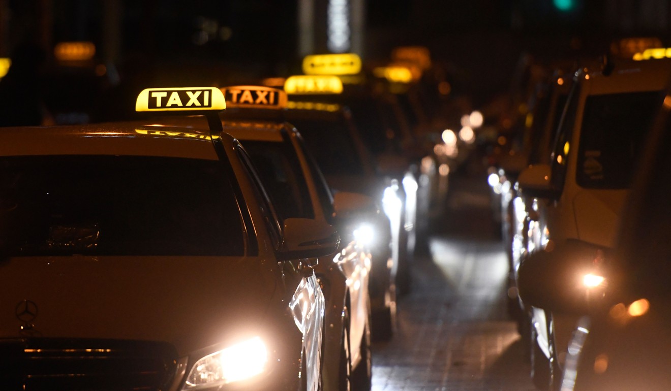 Taxis stand at the main railway station in Dortmund, western Germany. Photo: AFP