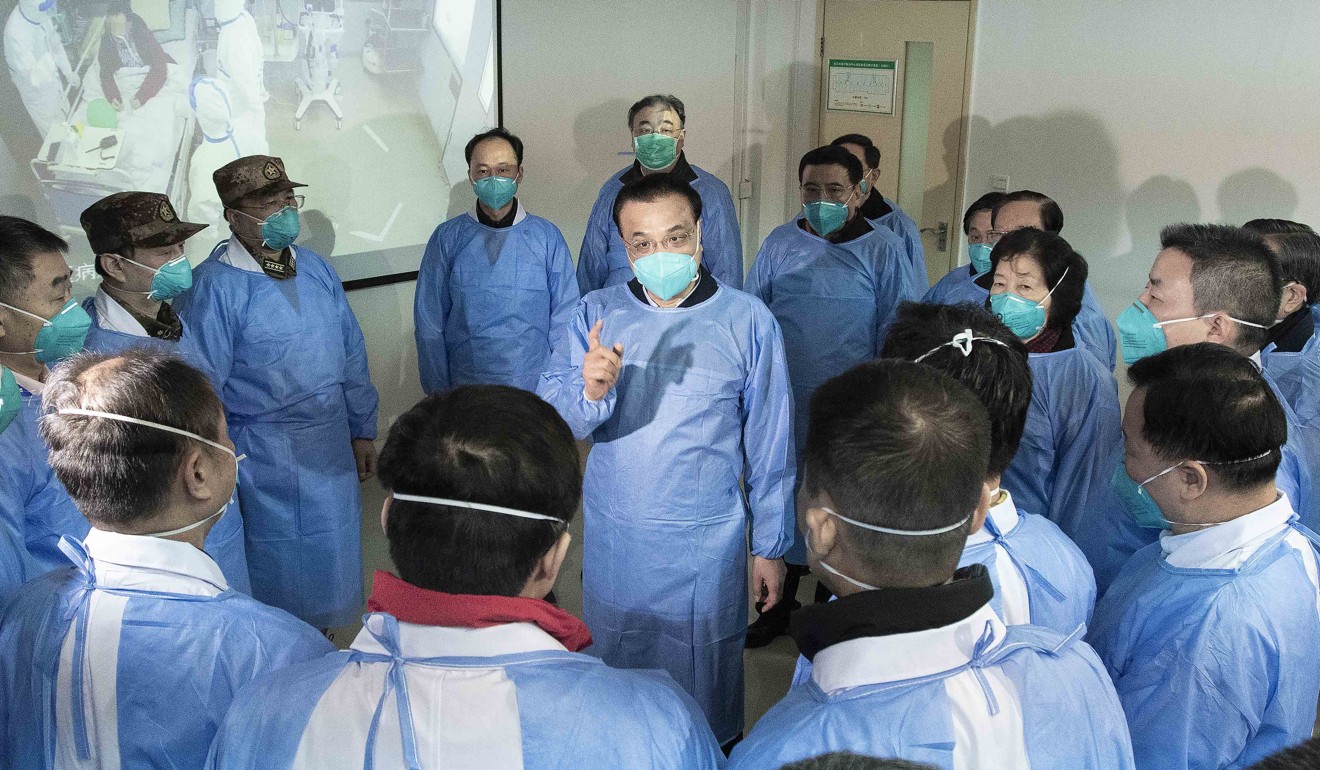 Chinese Premier Li Keqiang talks to frontline medical workers at Wuhan Jinyintan Hospital in Wuhan in central China’s Hubei province on January 27. Li has been tasked with directing the efforts to contain the spread of the novel coronavirus by Chinese President Xi Jinping. Photo: Xinhua