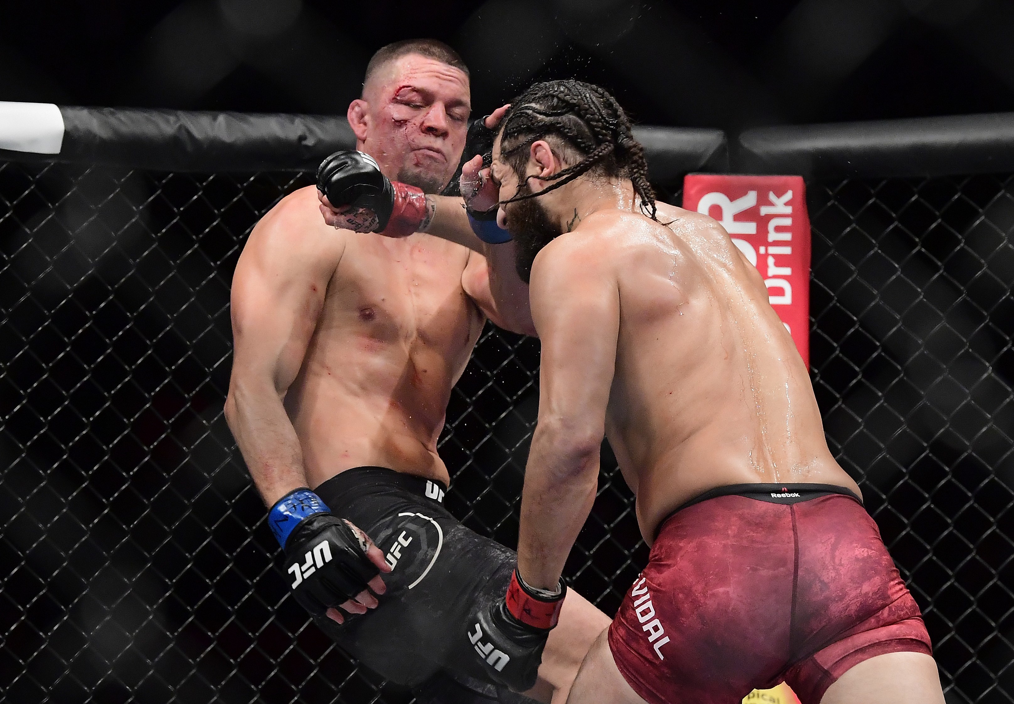 Jorge Masvidal throws a punch at Nate Diaz during UFC 244. Photo: AFP