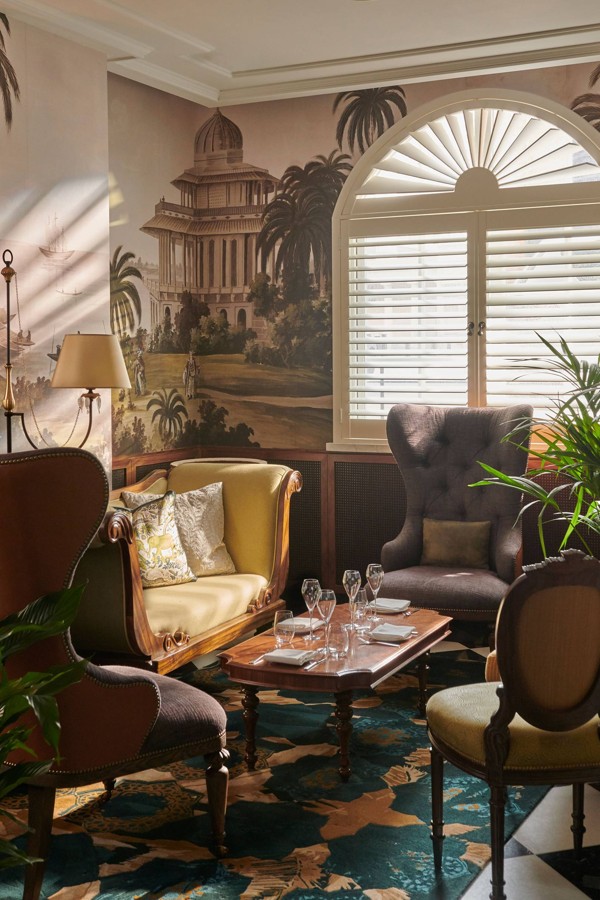 The Parlour’s painted wallpaper recalls the British Raj in India. Photo: Great Scotland Yard Hotel
