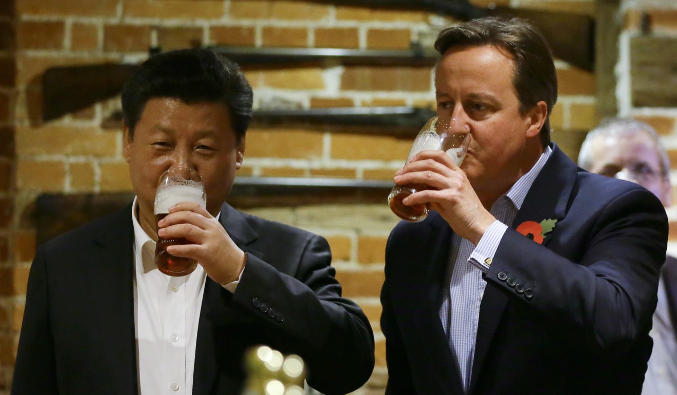 Visiting Chinese President Xi Jinping and then British prime minister David Cameron drink beer at a pub in Princess Risborough near Chequers, England, in October 2015. Xi’s first state visit to Britain was hailed as ushering in a “golden era” of British-Chinese relations. Photo: AFP