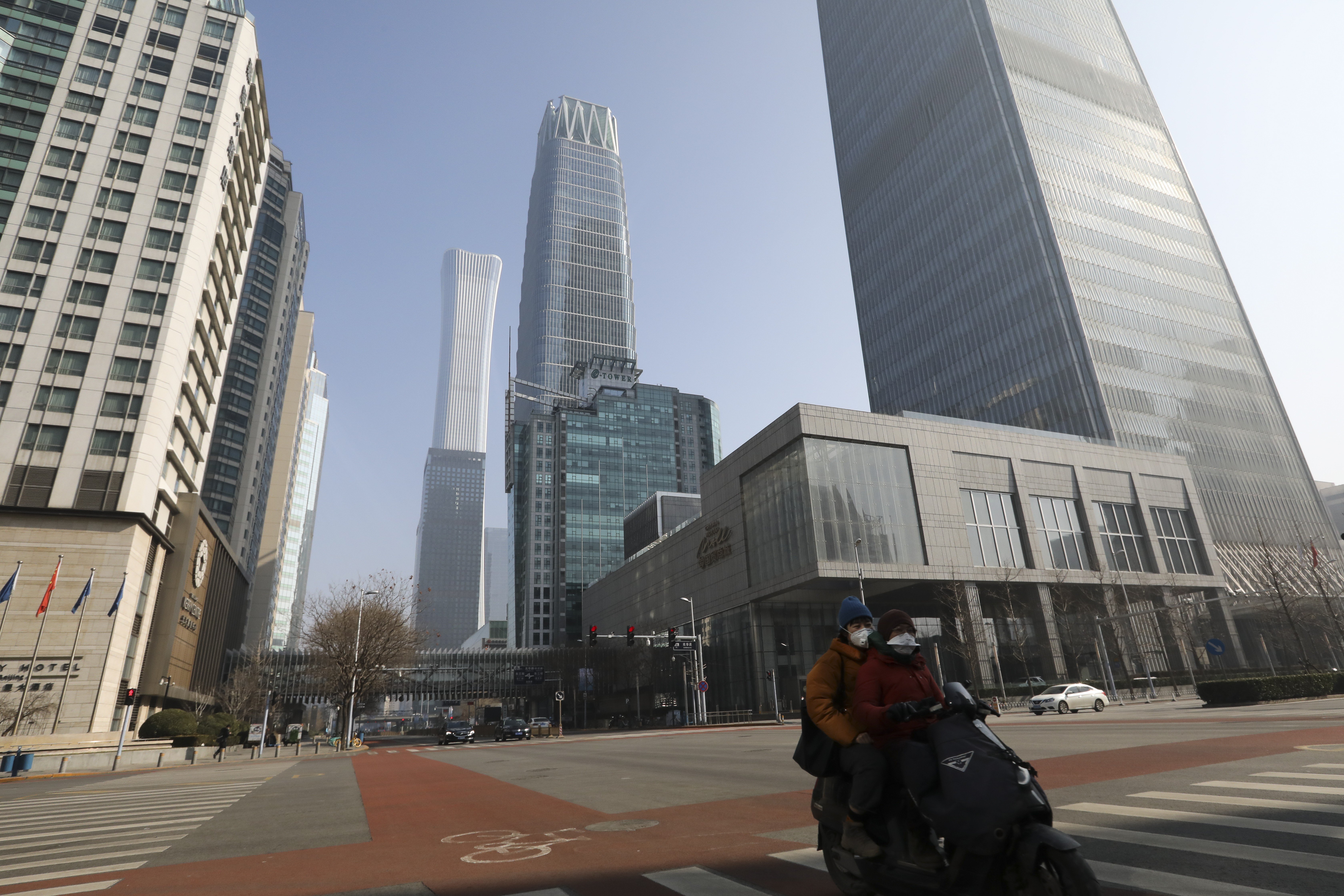 Empty streets in the central business area in downtown Beijing on February 10, the first working day after the extended Lunar New Year break. The epidemic is likely to cause only short-term economic pain. Photo: Simon Song