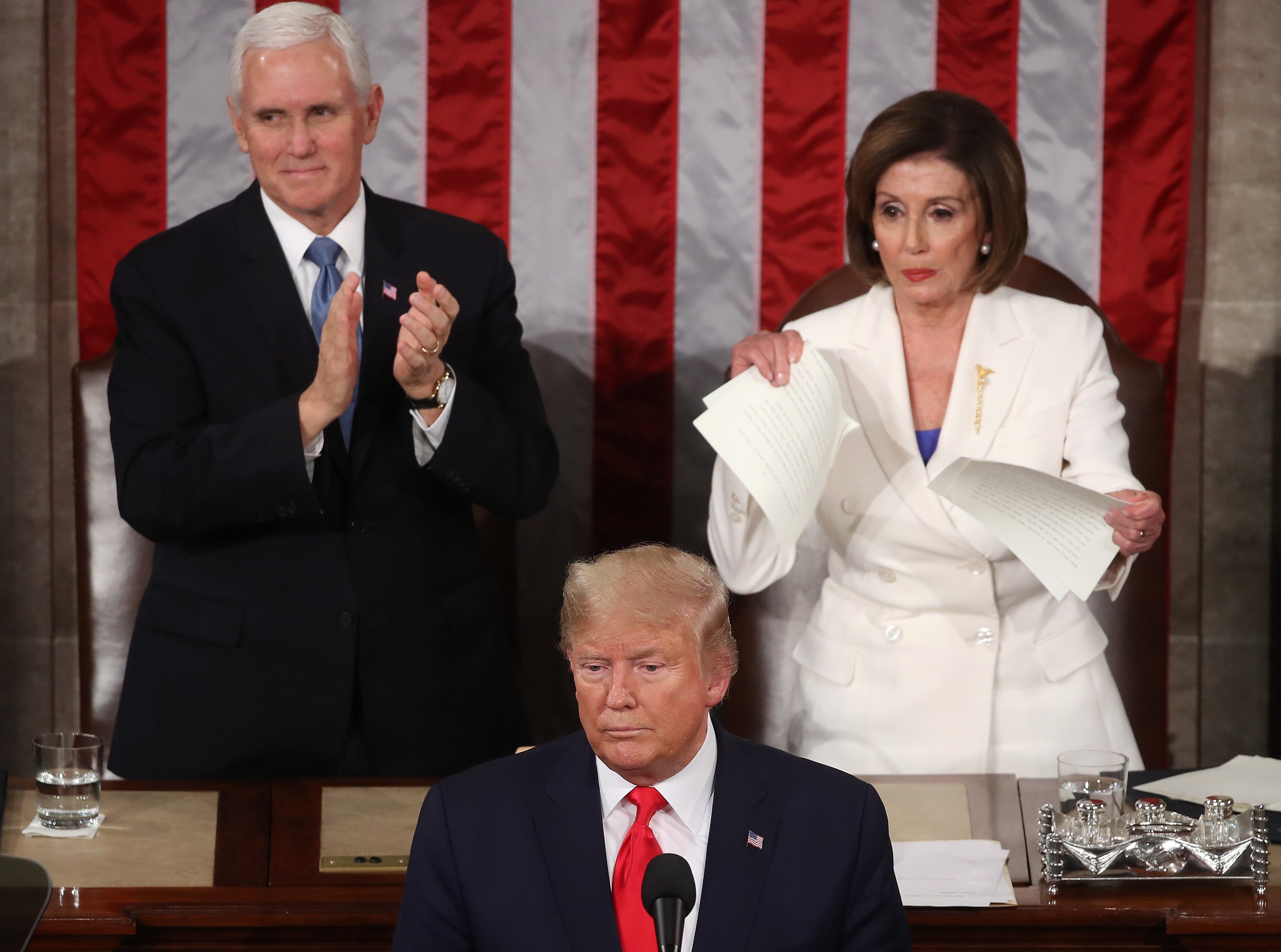 House Speaker Nancy Pelosi tears up her copy of President Trump’s state-of-the-nation speech on February 4, in a “courteous” expression of disapproval. Photo: AFP