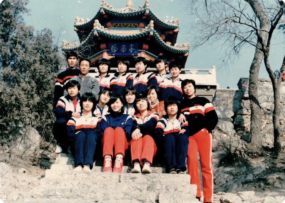 Wang (front, in red shoes) and her fellow athletes as a teenager in Hebei province.
