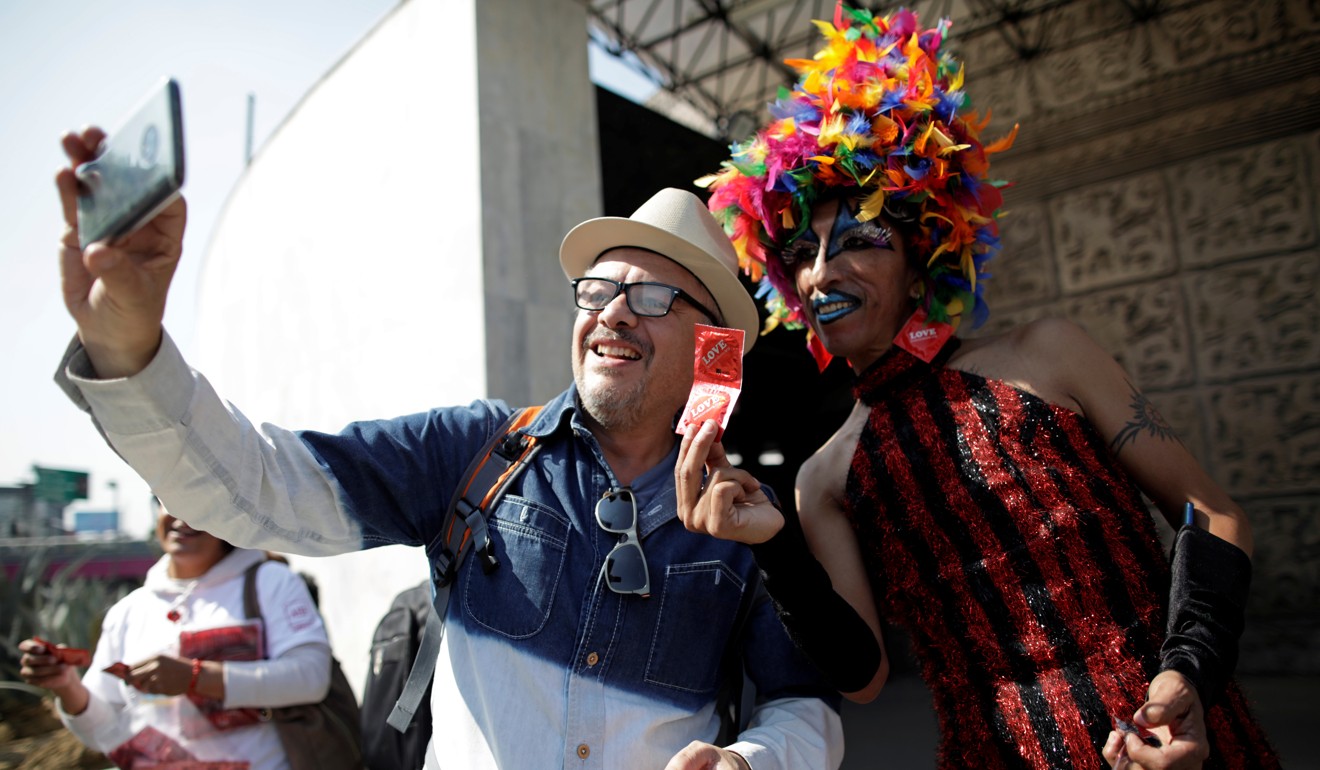 A drag queen poses for a selfie during an event organised by Aids Healthcare Foundation in Mexico City. Photo: Reuters