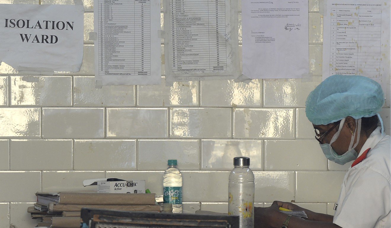 A nurse at an isolation ward in the government run Fever Hospital in Hyderabad. Photo: AFP