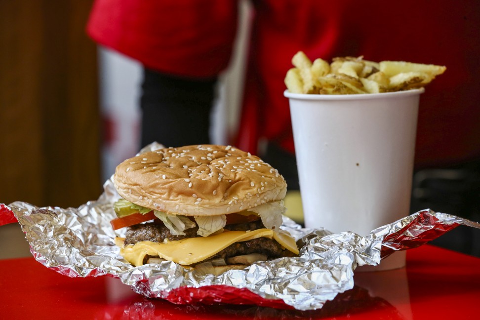 Cheeseburger and fries at Five Guys. Photo: Jonathan Wong
