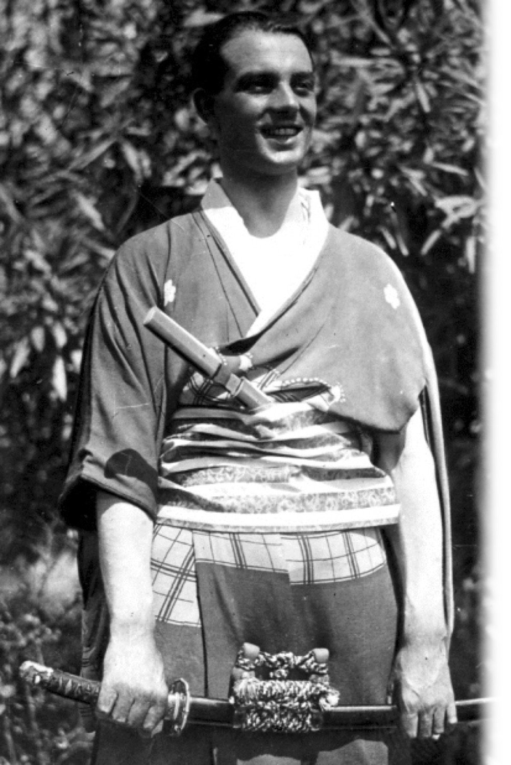 Pilot Arturo Ferrarin, who was the first person to fly from Europe to Japan, in a kimono given to him at the end of the Rome to Tokyo race.