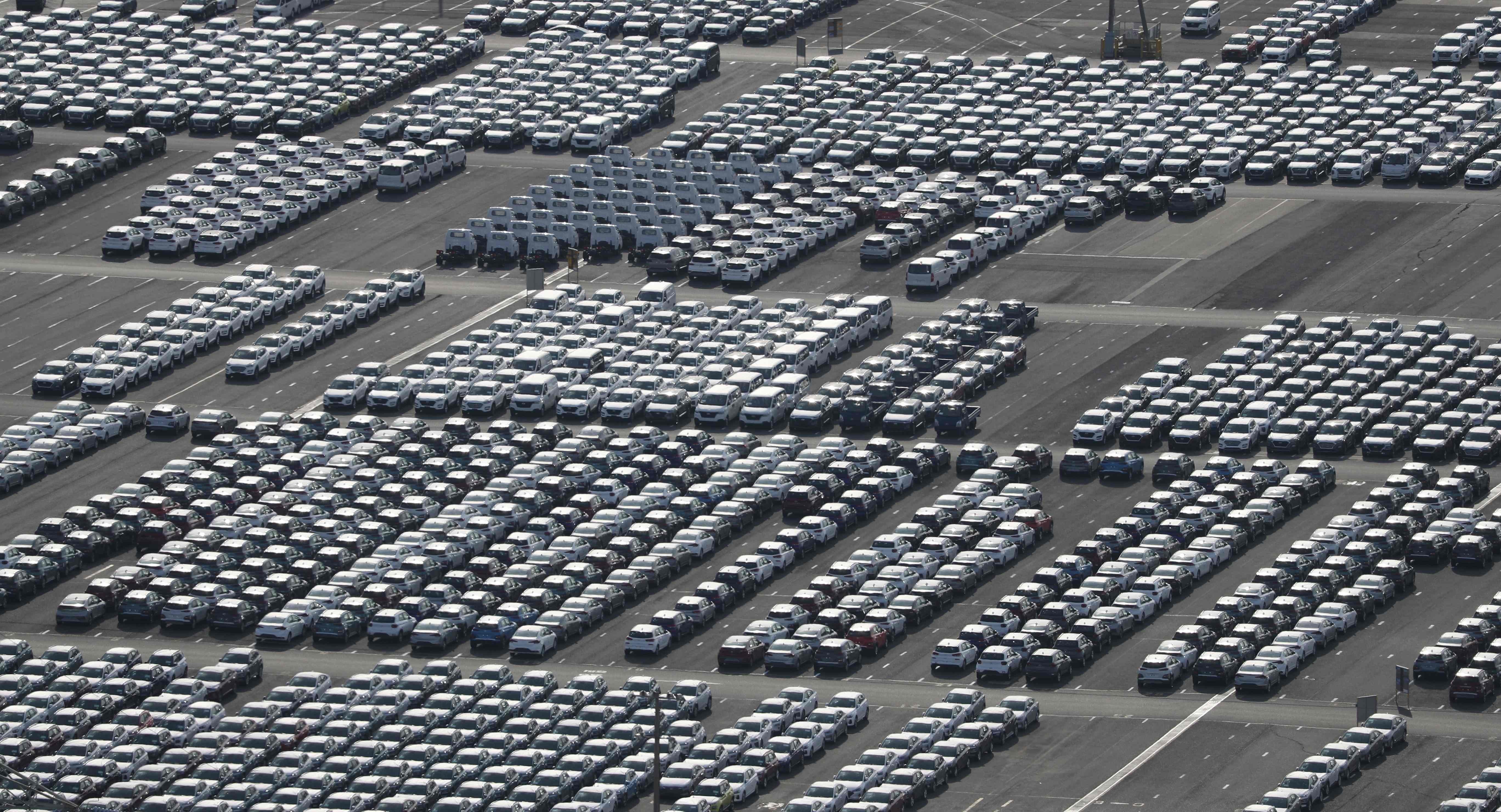 Rows of Hyundai cars are parked for shipping in the southeastern port of Ulsan in South Korea. Hyundai has suspended work at a factory in Ulsan, hamstrung by a lack of parts as the coronavirus outbreak cripples China’s industrial output. Photo: AFP