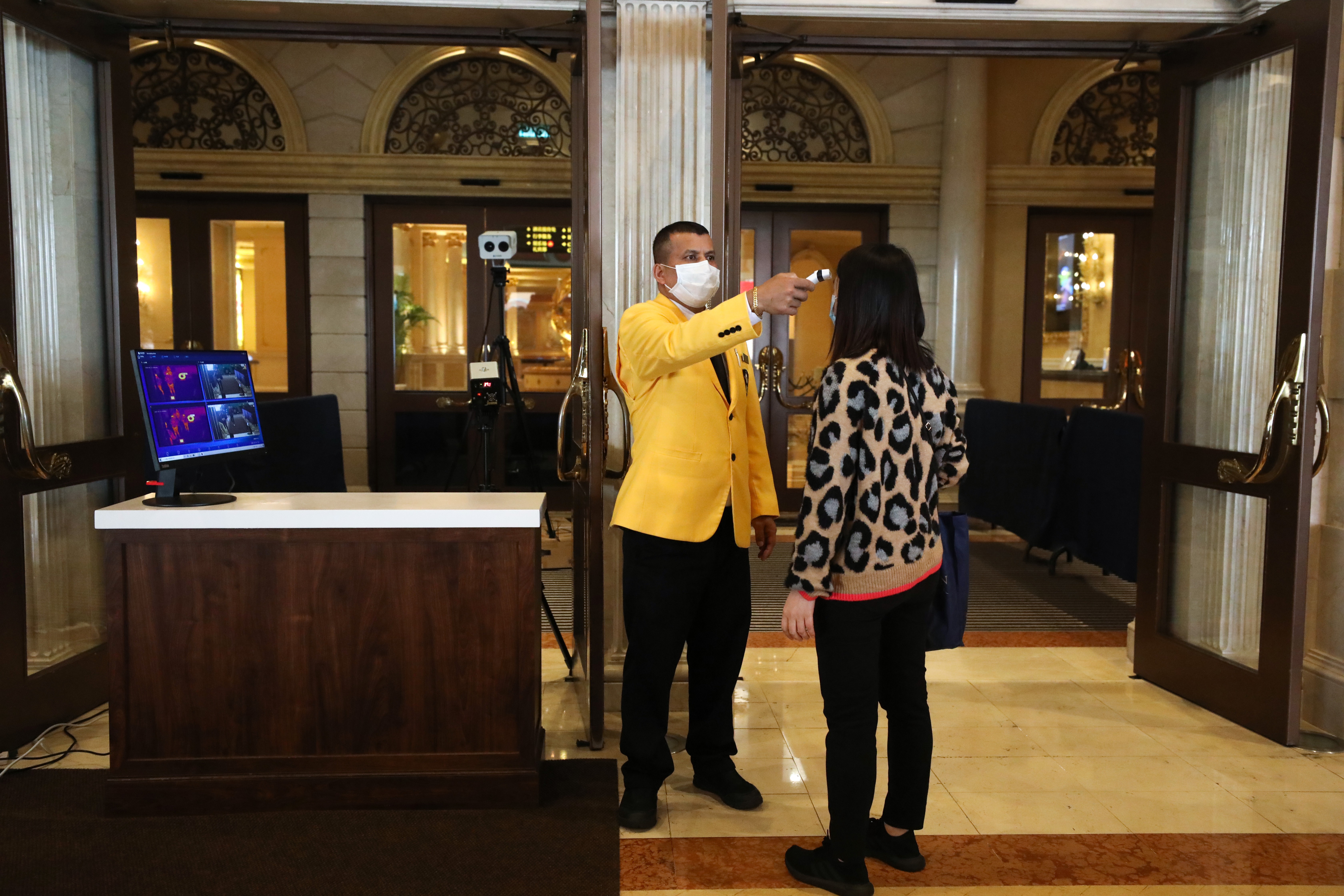 Punters have their temperature checked when entering the Venetian Macau. Photo: Nora Tam