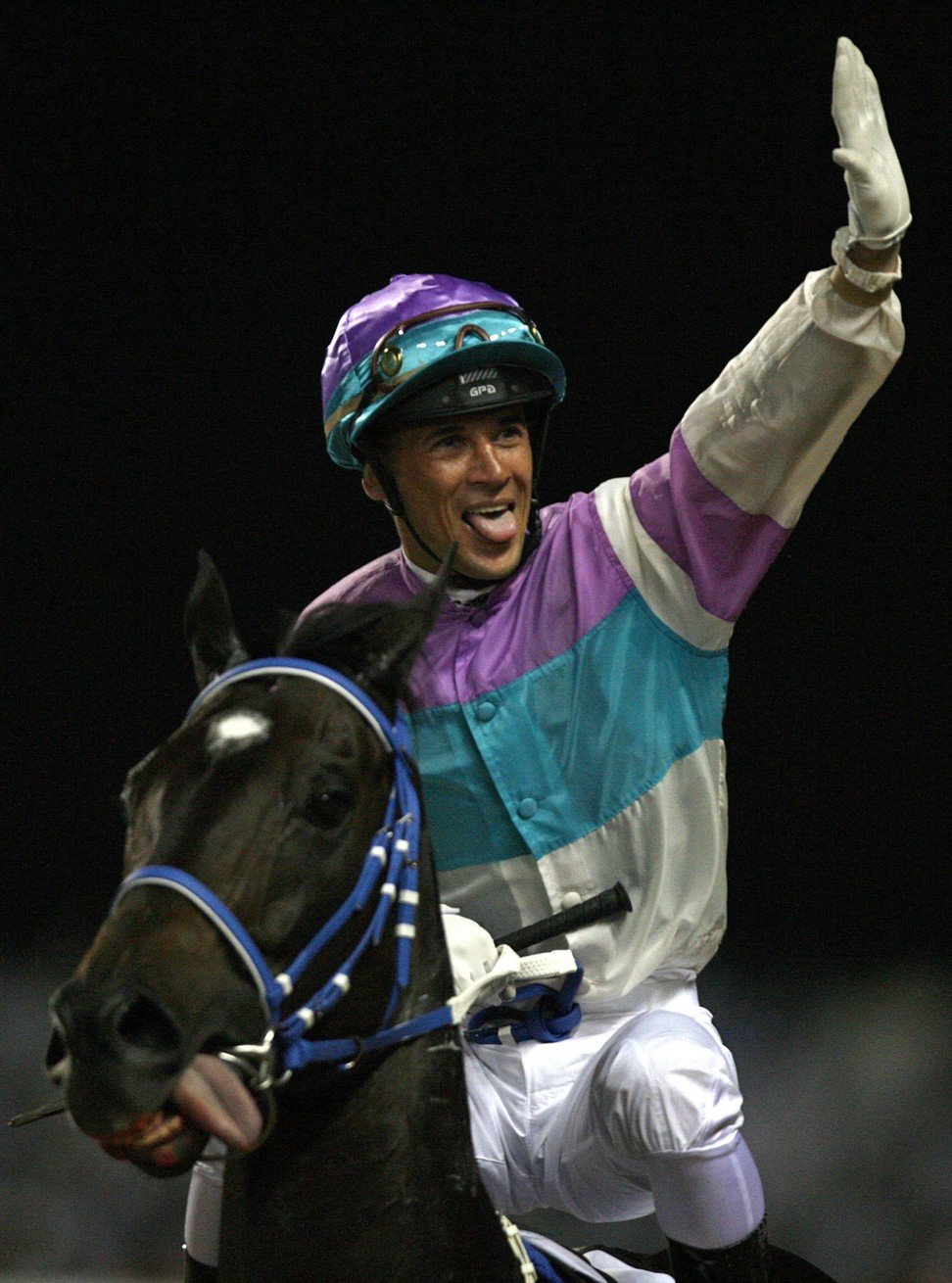 Anthony Delpech celebrates after winning the 2007 Dubai Sheema Classic with Vengeance Of Rain. Photo: Reuters