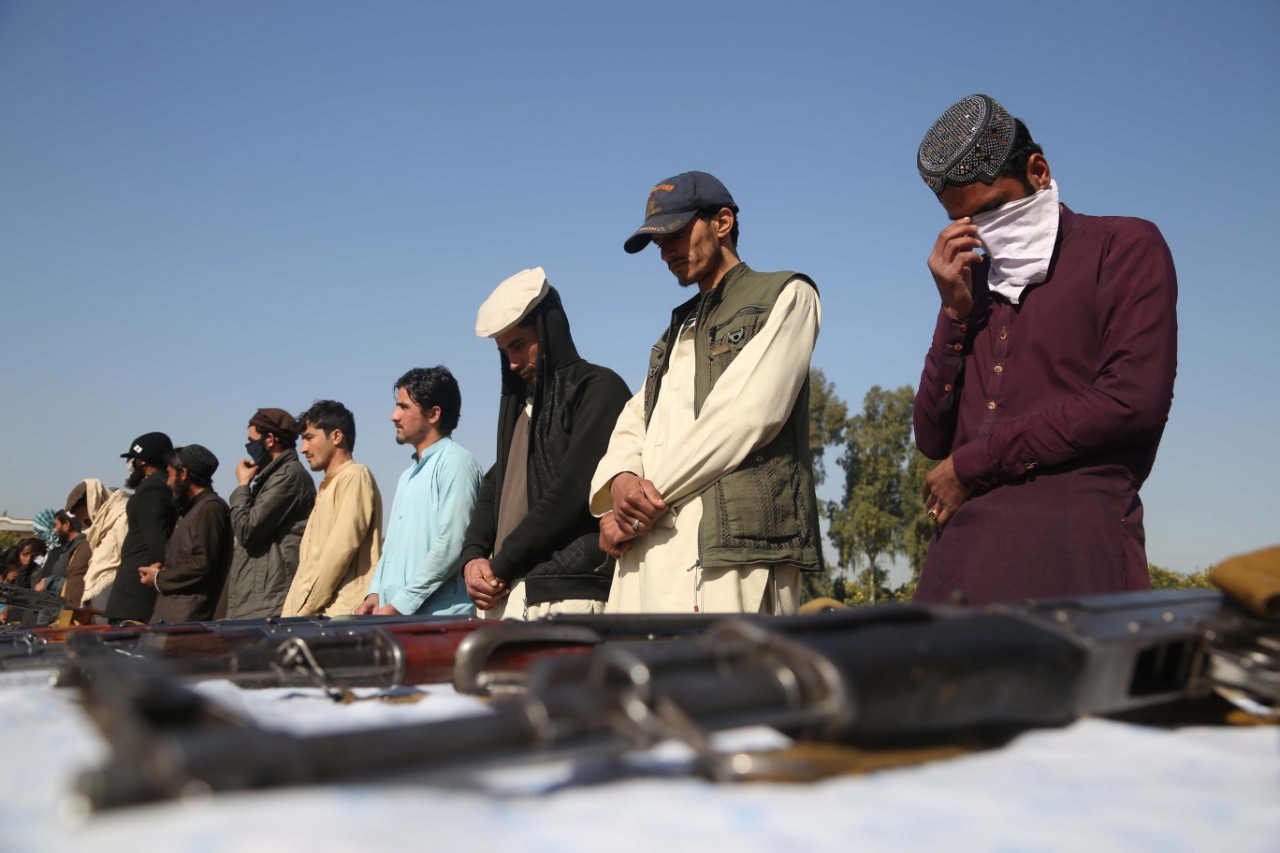 A group of former Taliban militants surrender their weapons during a reconciliation ceremony in Jalalabad, Afghanistan. The Taliban is expected to sign a formal peace deal with the US by the end of this month. February. Photo: EPA-EFE