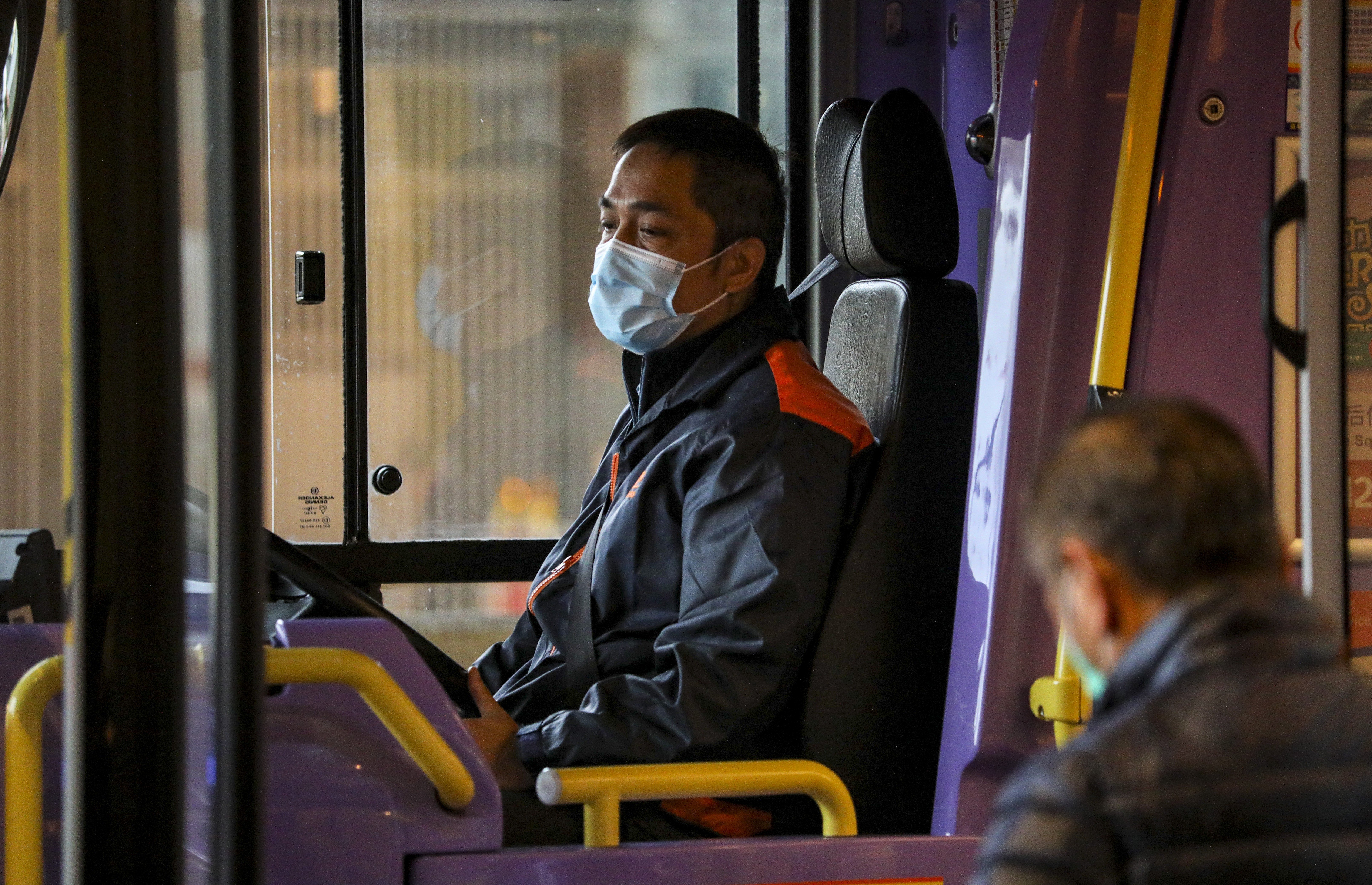 A bus driver seen wearing a surgical mask in Admiralty. Photo: Dickson Lee