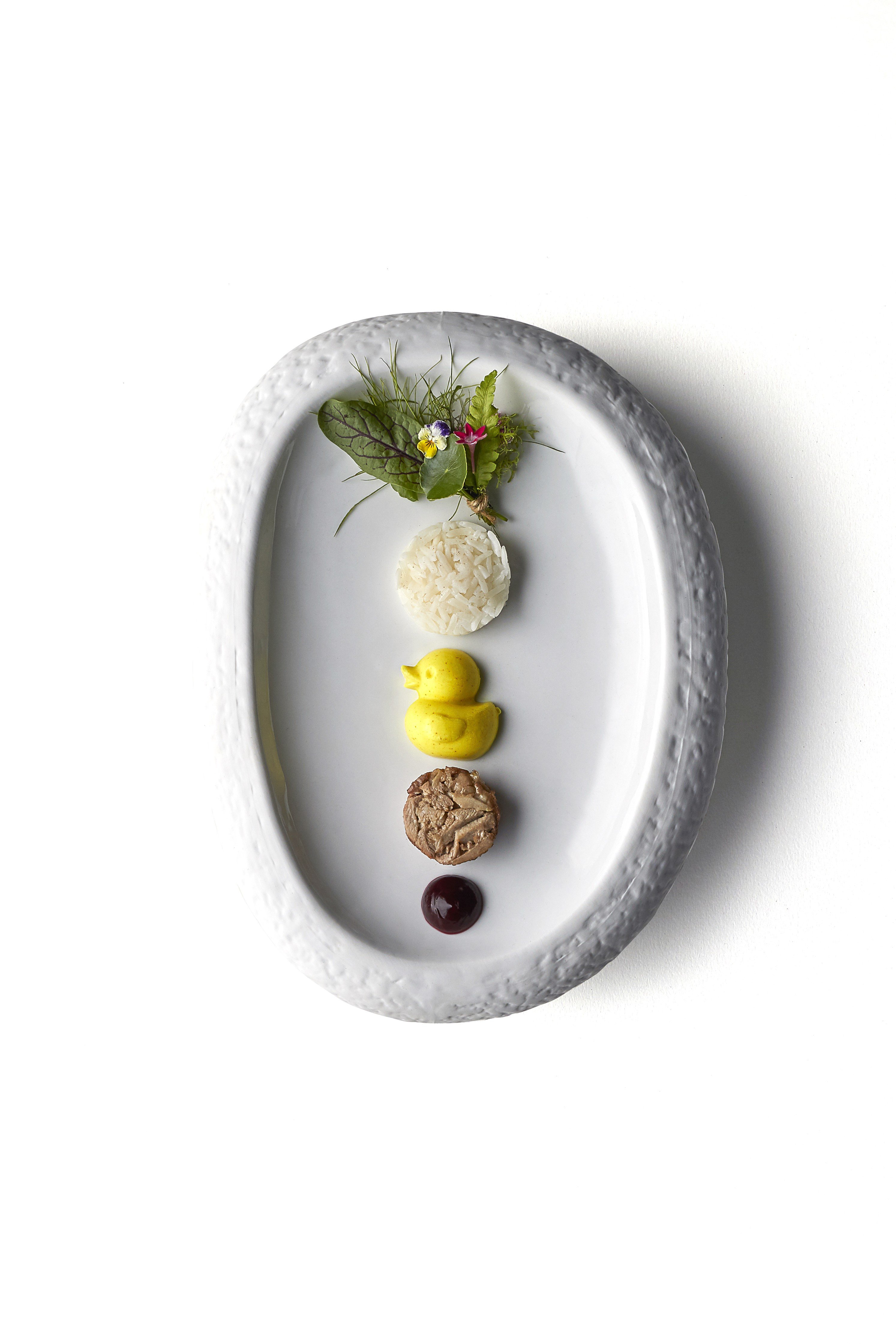 Disappearing Duck by Haoma in Bangkok – it features Madras curry ‘duck’ paired with a wing wrapped in lentils and mango dust, served with seven herbs from the restaurant’s urban farm. Photo: Haoma