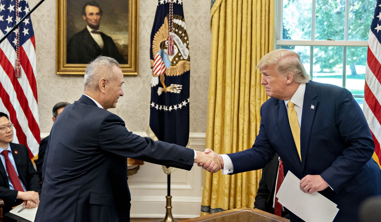 US President Donald Trump shakes hands with Liu He, China’s vice premier, during a meeting in the Oval Office of the White House in October 2019. Photo: Bloomberg