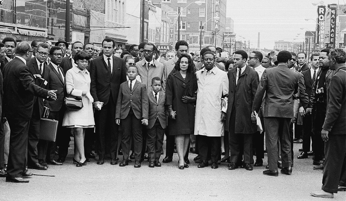 Coretta Scott King (centre left, in black), the widow of Dr Martin Luther King Jnr, their daughter Yolanda (in white coat, left), their sons Martin Luther King III and Dexter Scott King, and fellow civil rights leaders march after King’s assassination. Photo: Robert Abbott Sengstacke/Getty Images