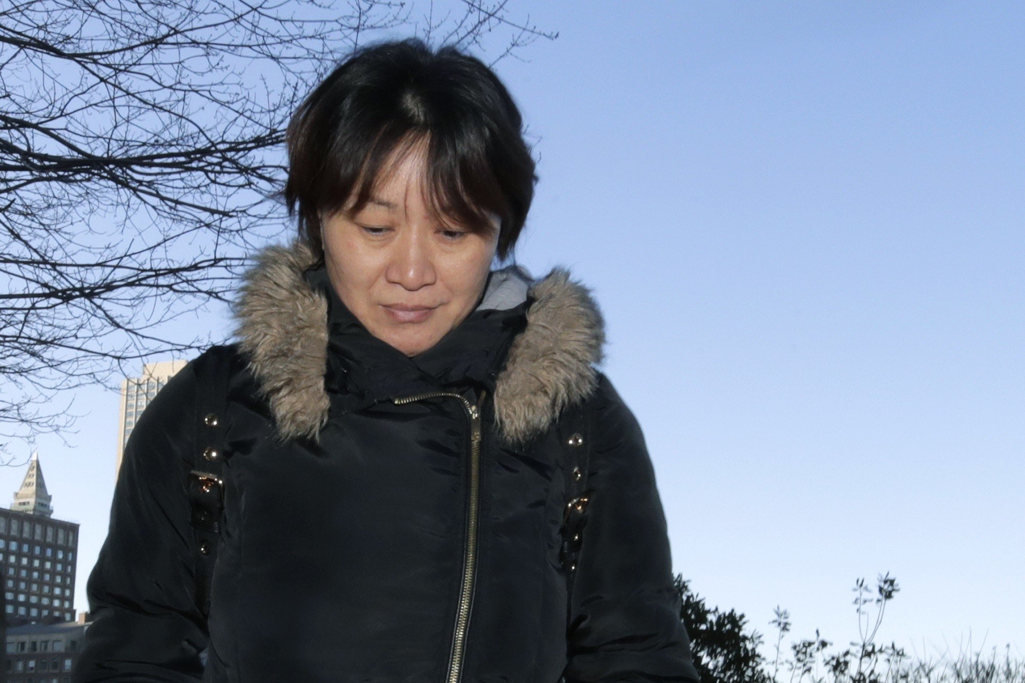 Xiaoning Sui, a Chinese national living in Canada, leaves federal court in Boston on Friday. Photo: AP