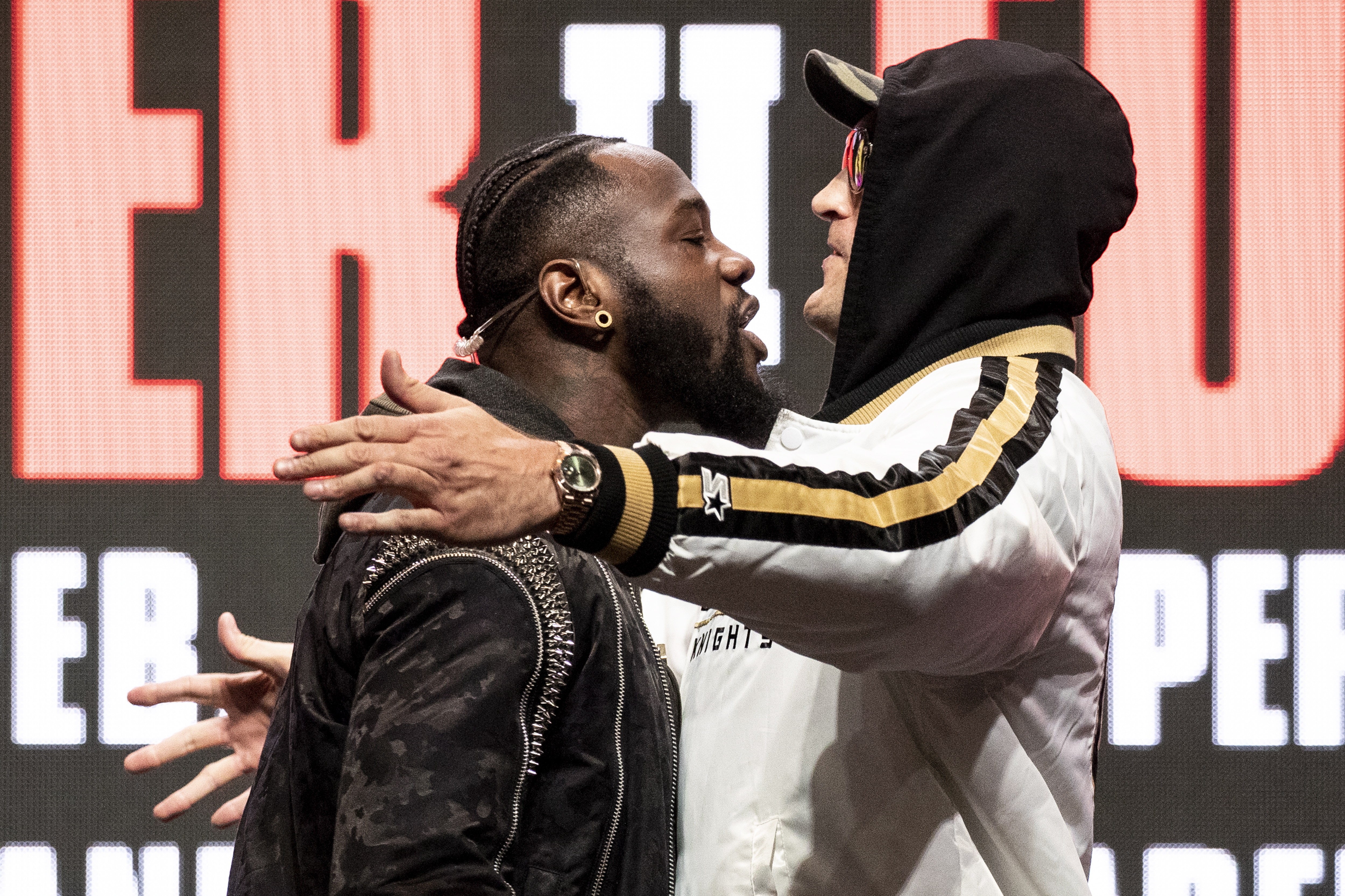 Deontay Wilder (left) and Tyson Fury face off on stage during a press conference before their rematch for the WBC heavyweight world championship at the Garden Arena in Las Vegas, Nevada. Photo: EPA