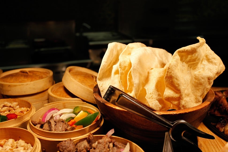 Did prawn crackers originate from Malaysia or Indonesia, and which country  has the better version?