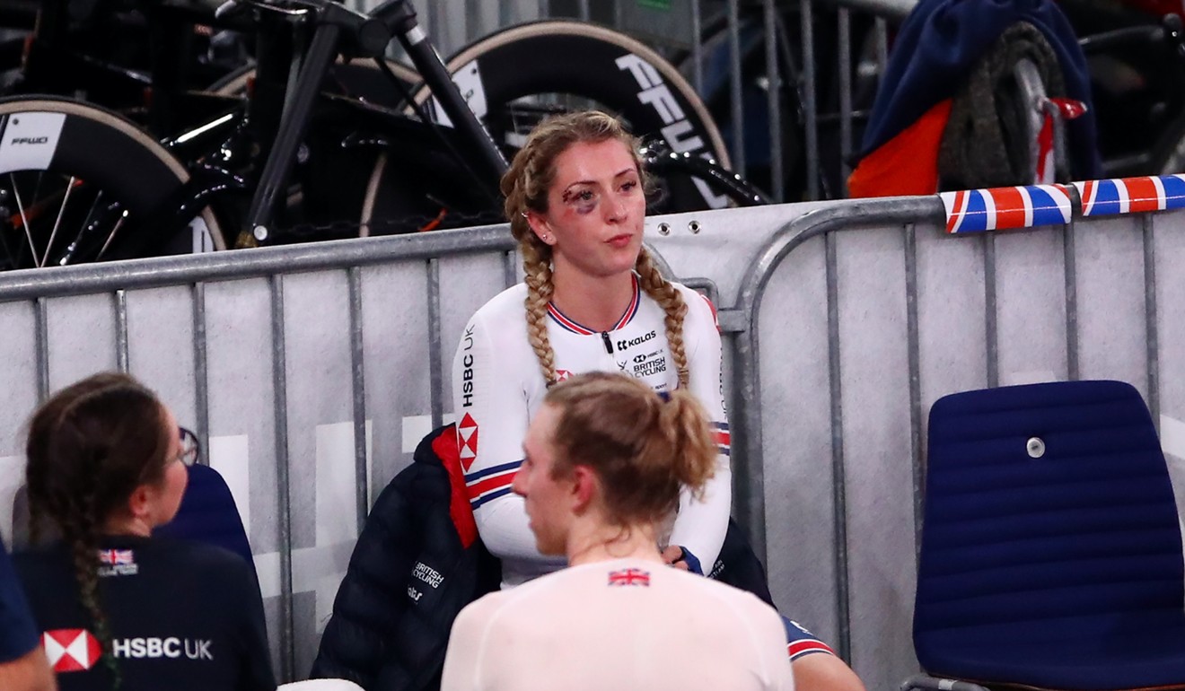 British star Laura Kenny sits in the team area after a crash during the women's omnium scratch race. Photo: PA Wire