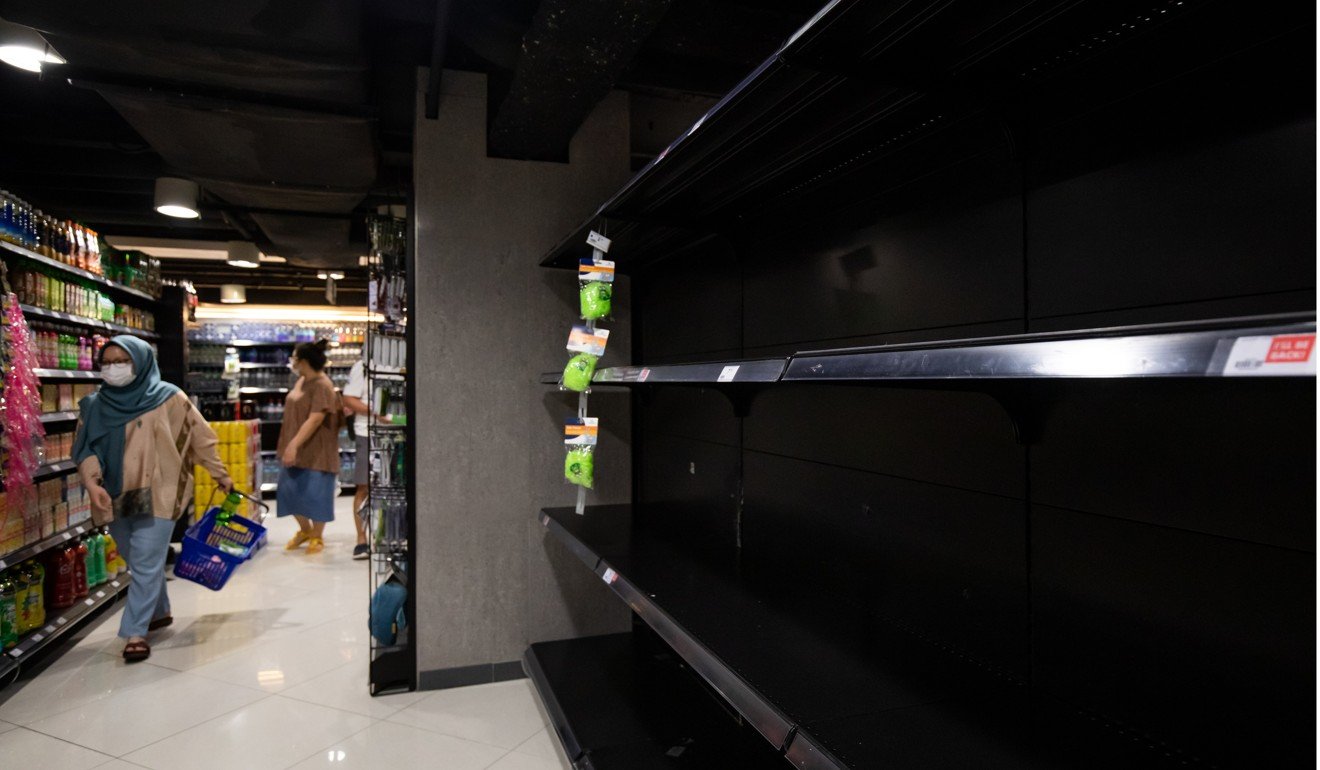 People in Singapore have been panic buying. Photo: Bloomberg