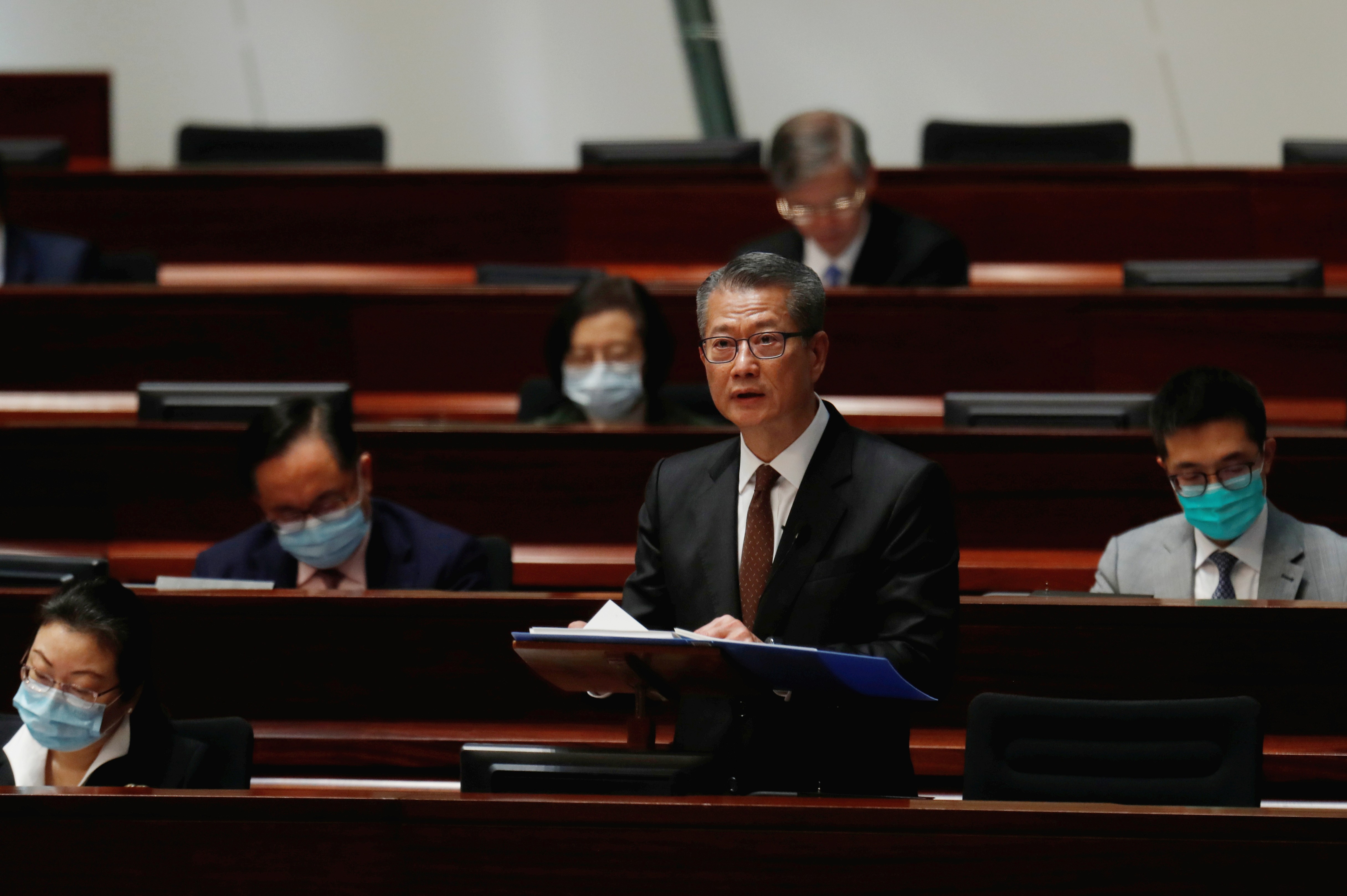 Hong Kong Financial Secretary Paul Chan delivers the budget speech at the Legislative Council on February 26. Photo: Reuters