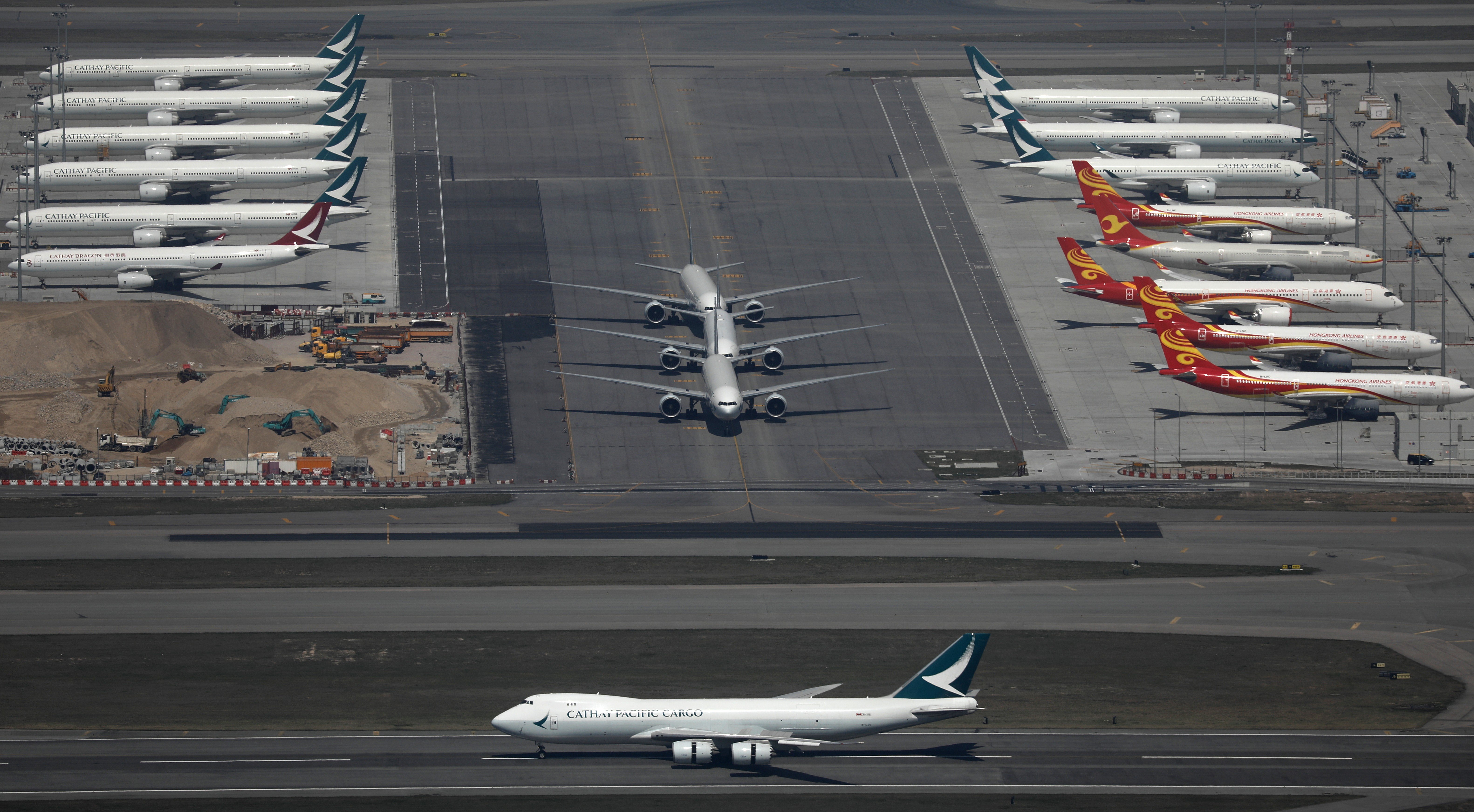 Cathay Pacific aircraft are seen lined up on the tarmac at Hong Kong International Airport. Photo: Sam Tsang