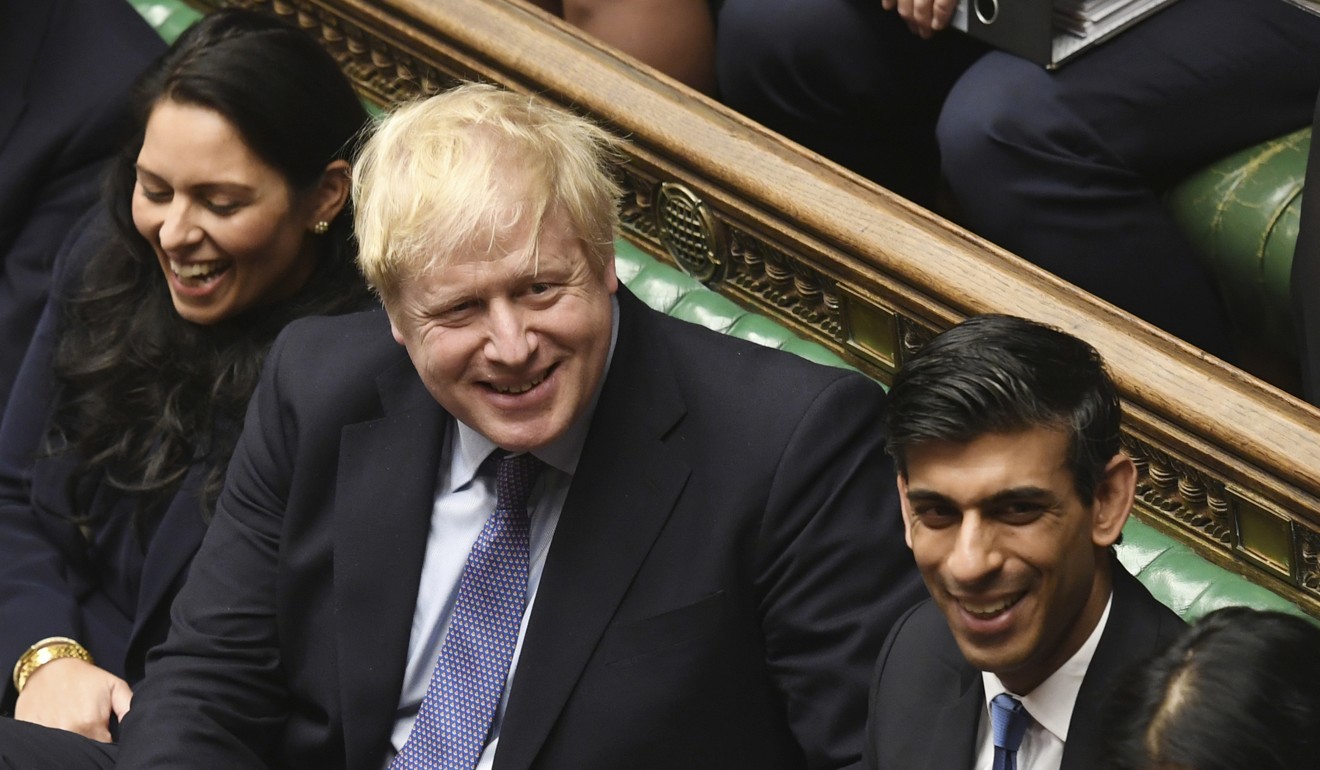 From left, Home Secretary Priti Patel, British Prime Minister Boris Johnson and Chancellor of the Exchequer Rishi Sunak in the UK House of Commons. Photo: AP