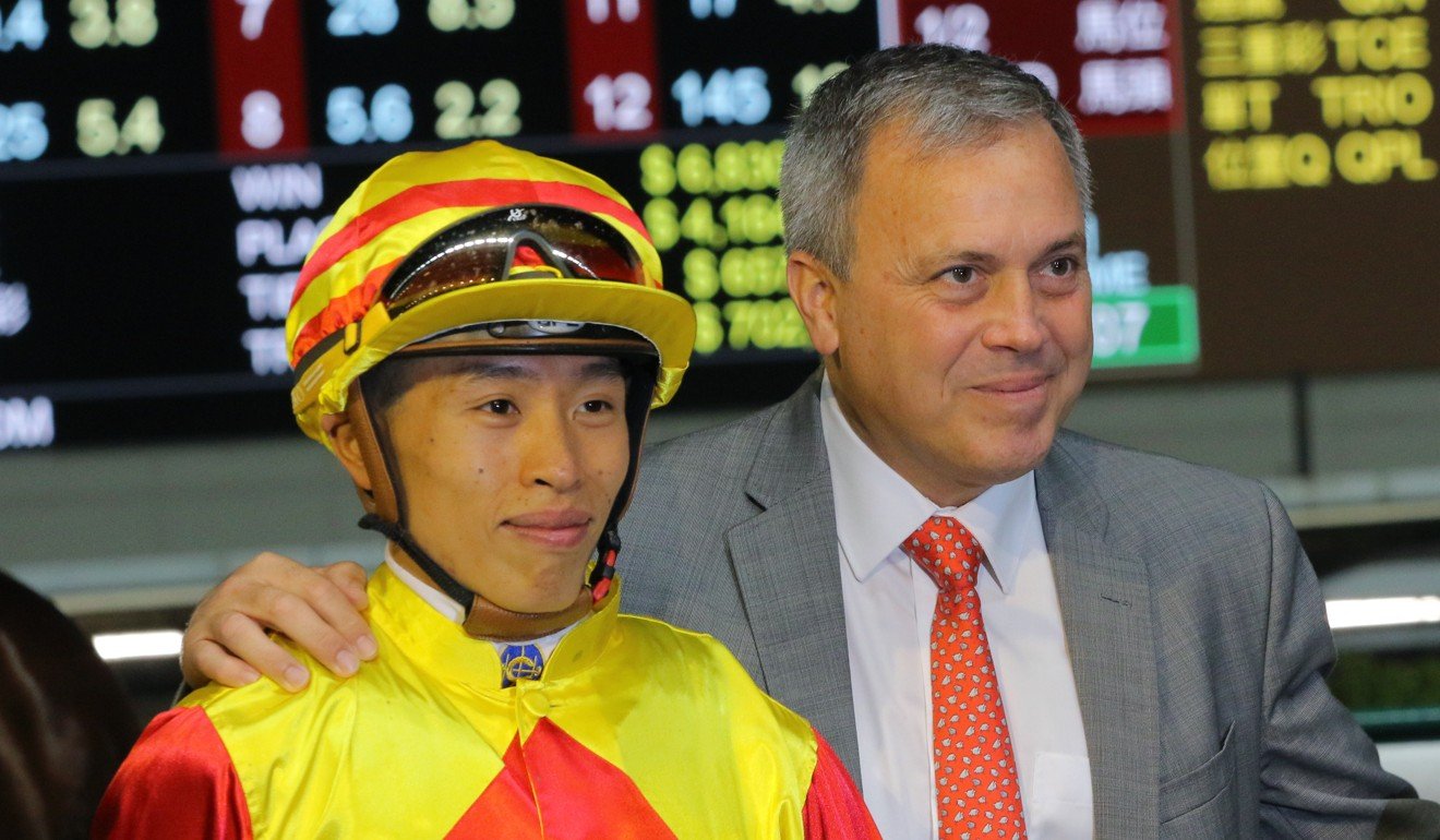 Vincent Ho with Caspar Fownes after winning with Shamport at Happy Valley earlier this season.