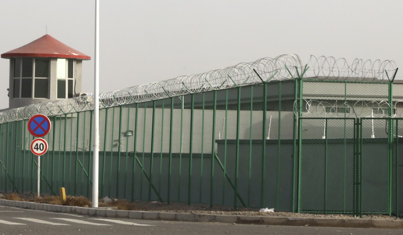 A guard tower and barbed wire fences are seen surrounding one of Xinjiang’s ‘vocational training centre’ in 2018. Photo: AP