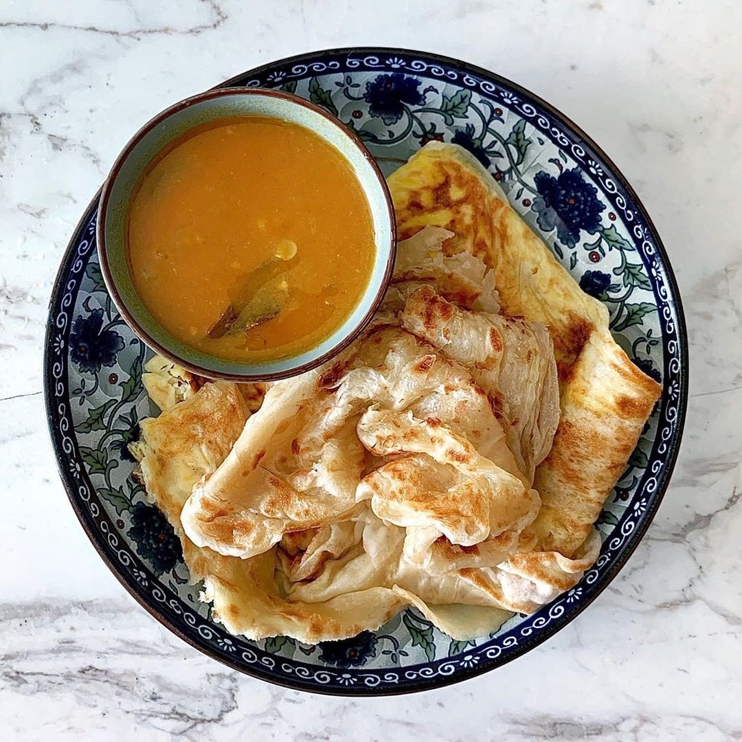 Roti isn’t so much a food in Southeast Asia as a way of life. This humble Indian pastry transcends all races in Malaysia and is adored by young and old, men and women. Photo: @breadetbutter / Instagram