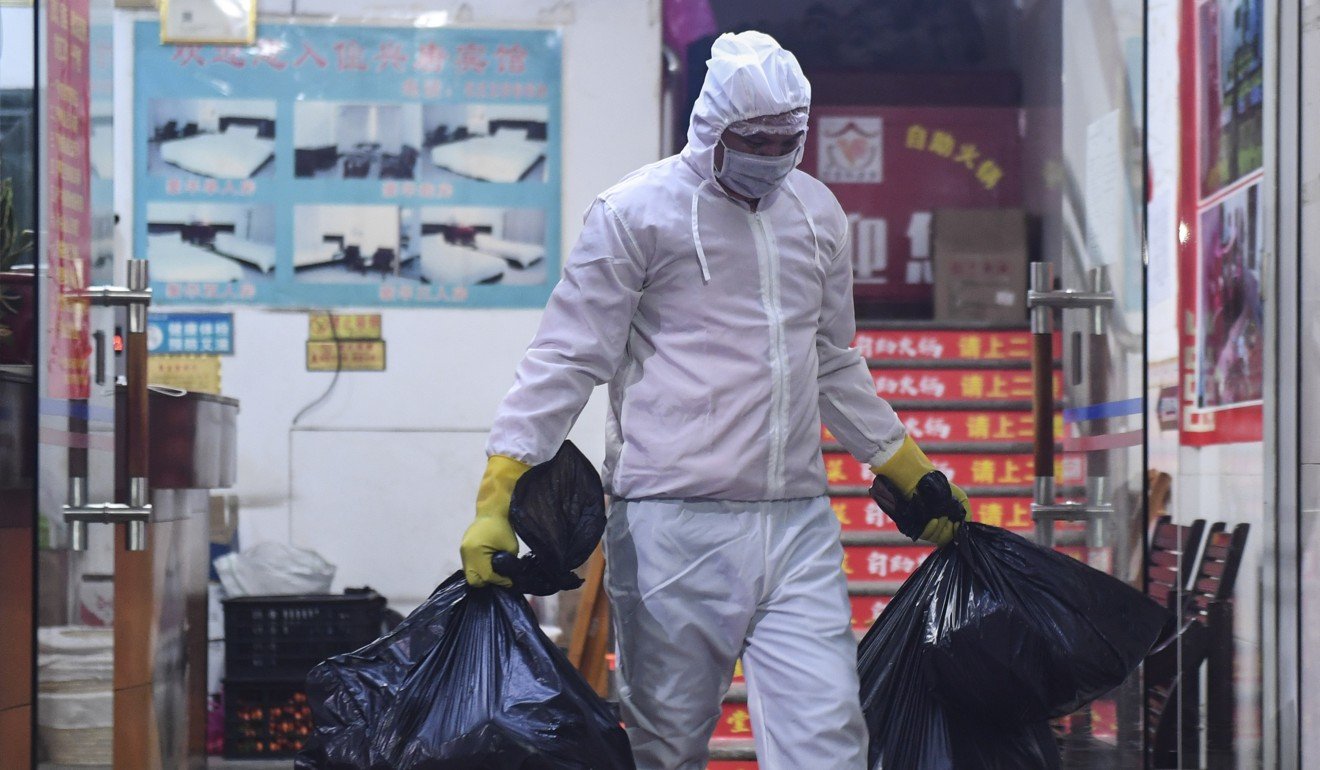People in Wuhan frequently reuse their face masks to reduce waste. Photo: Xinhua
