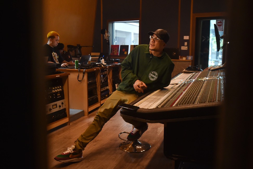 Thai-US rapper Intachai records a track in a studio in Pattaya, Thailand. Photo: AFP