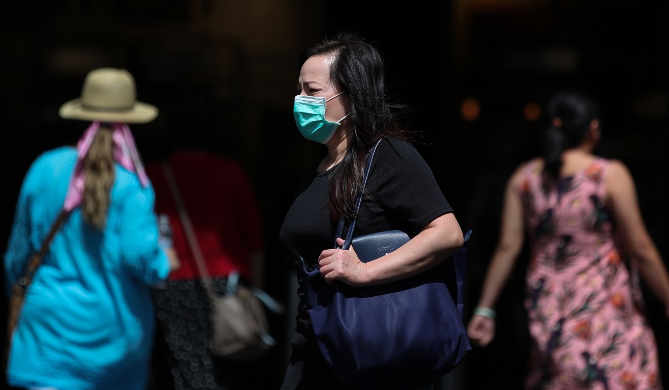 A woman seen in a protective face mask in Sydney, Australia, on March 2, 2020. Photo: Xinhua