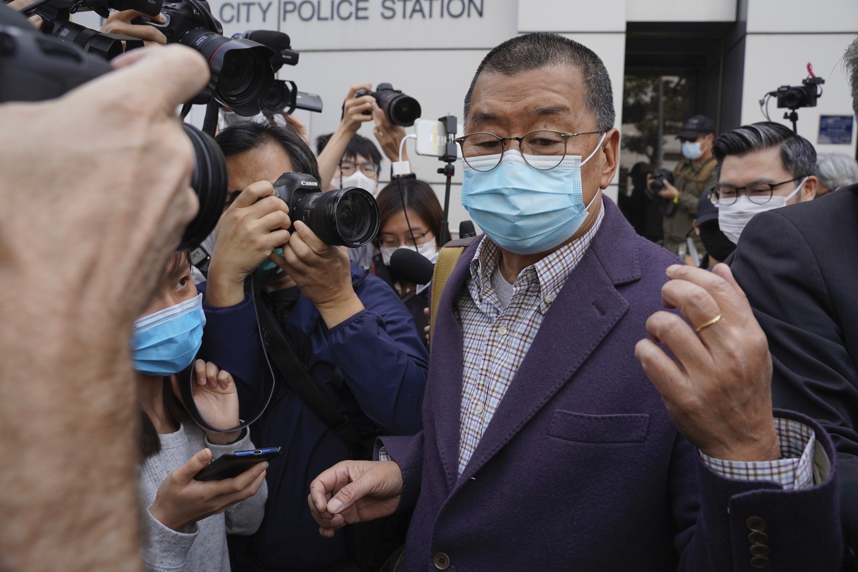 Apple Daily founder Jimmy Lai is released from a police station on bail on February 28. Photo: AP