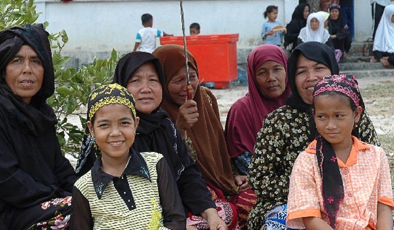 Cham women and children pictured in Cambodia. Photo: Handout