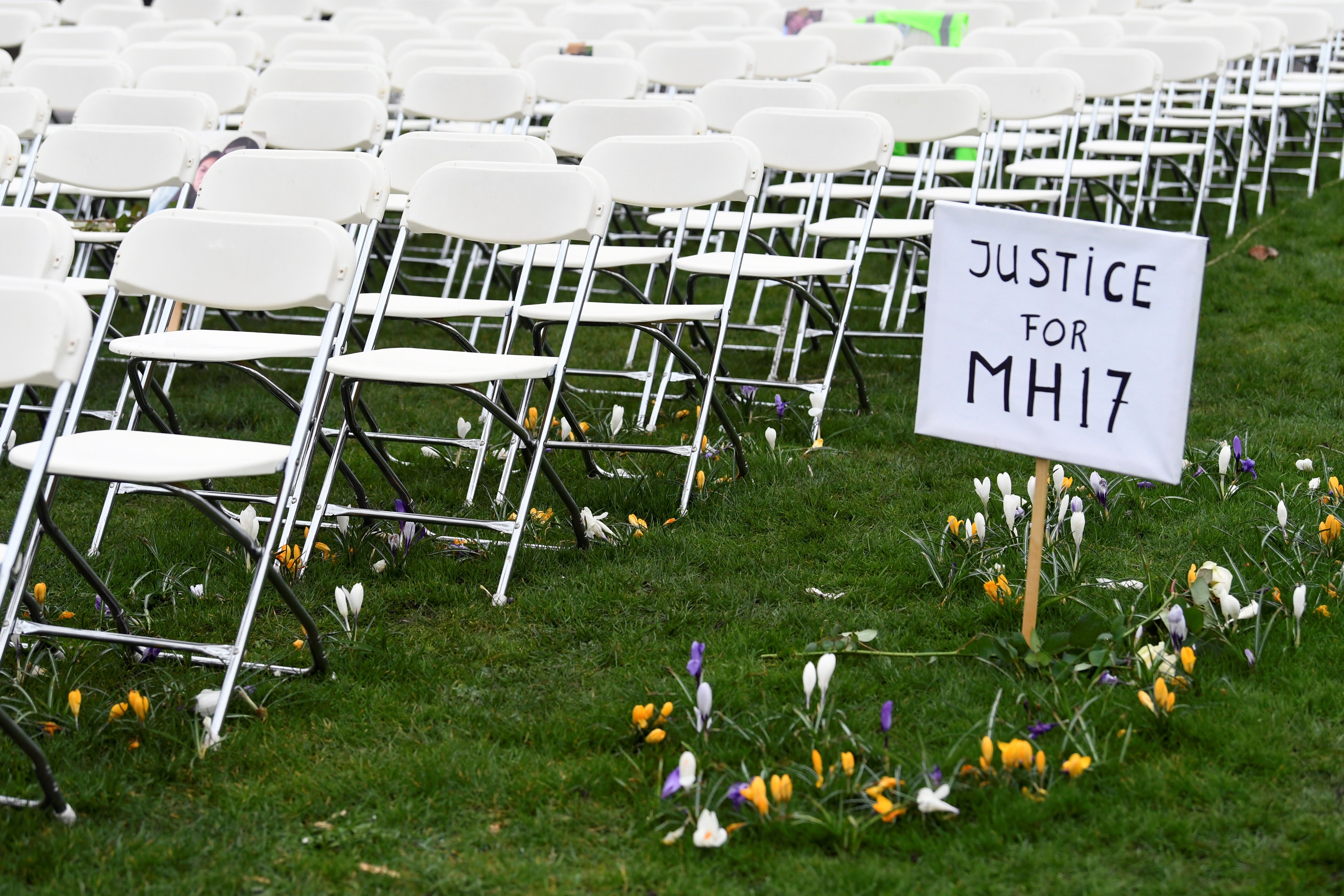 Rows of empty chairs, each one representing a seat on the downed MH17, arranged outside the Russian embassy in The Hague. Photo: Reuters