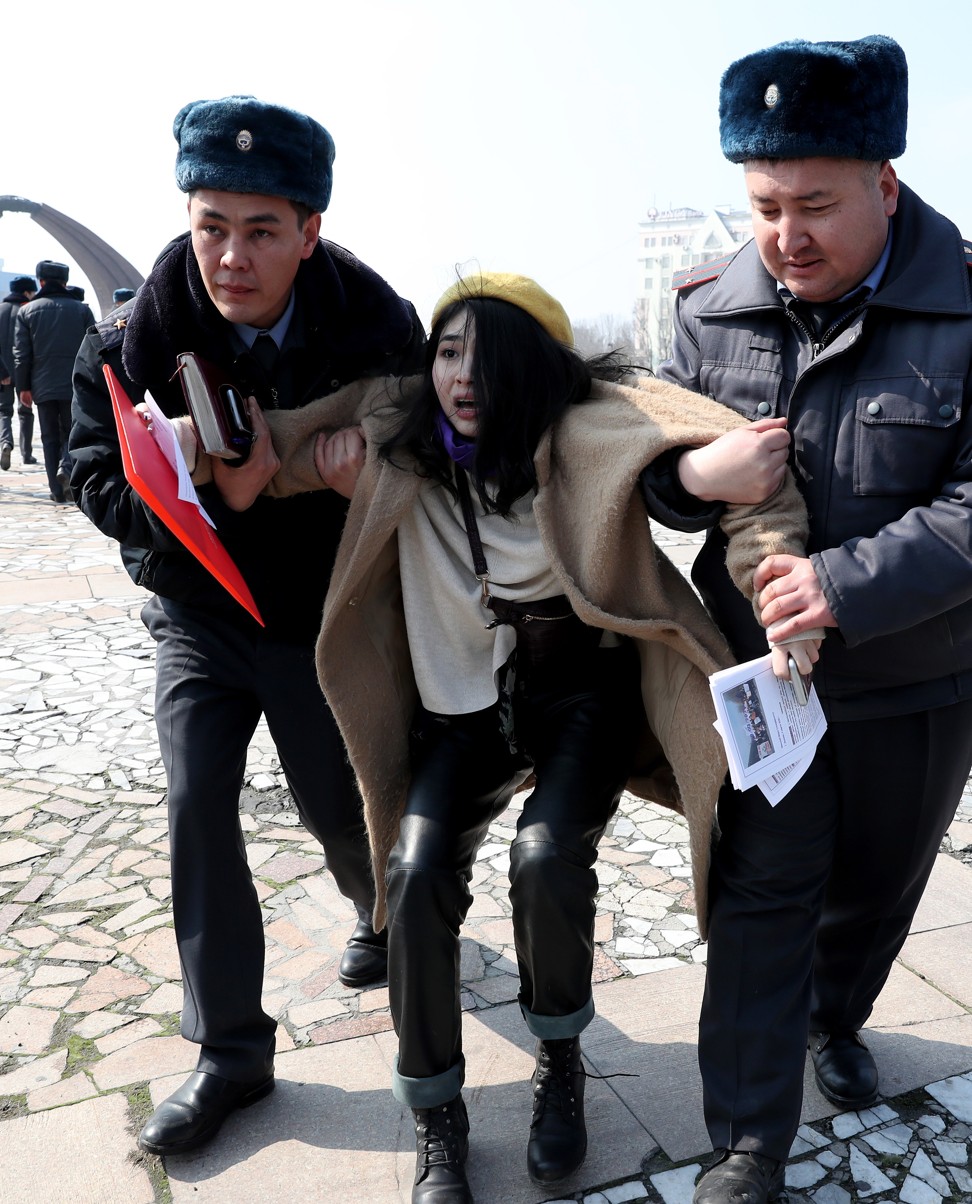 Police detain an activist in Bishkek, Kyrgyzstan. Photo: EPA