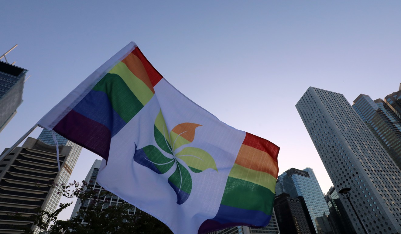 Hong Kong SAR flag in rainbow pride colours flies at a 2019 Pride assembly in November 2019. Photo: Felix Wong