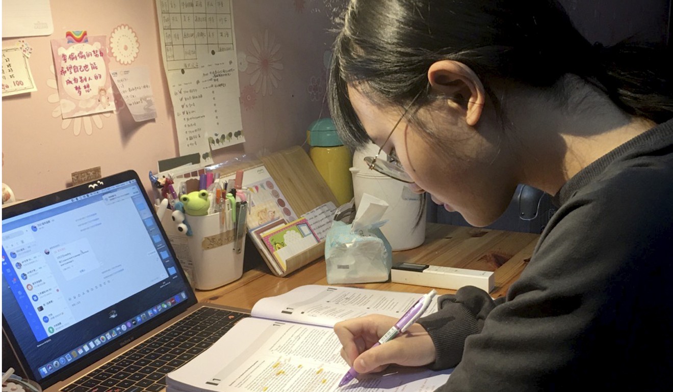 A secondary school student in Chongqing, southwest China, pictured studying at home last month. Photo: AP